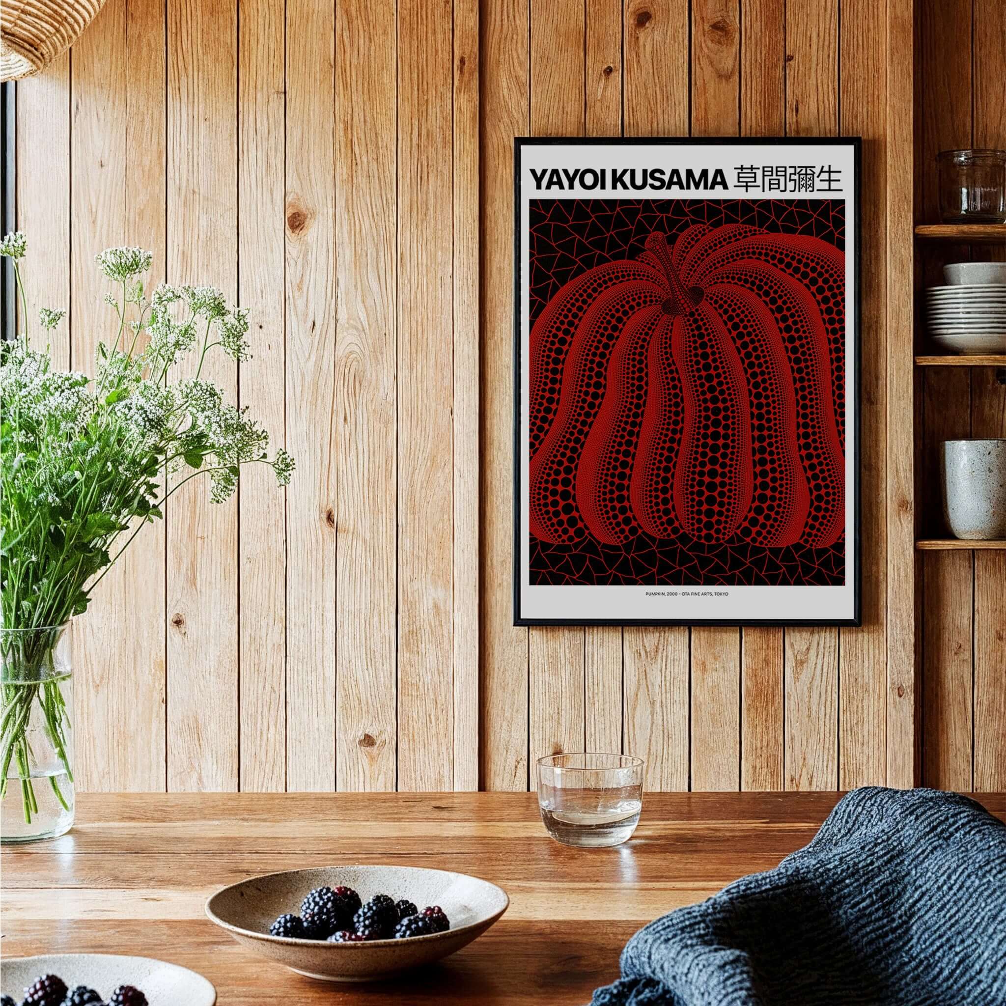 Yayoi Kusama Red Black Pumpkin 2000 Tokyo Exhibition Poster Polka Dot Art Print displayed in a cozy interior setting.