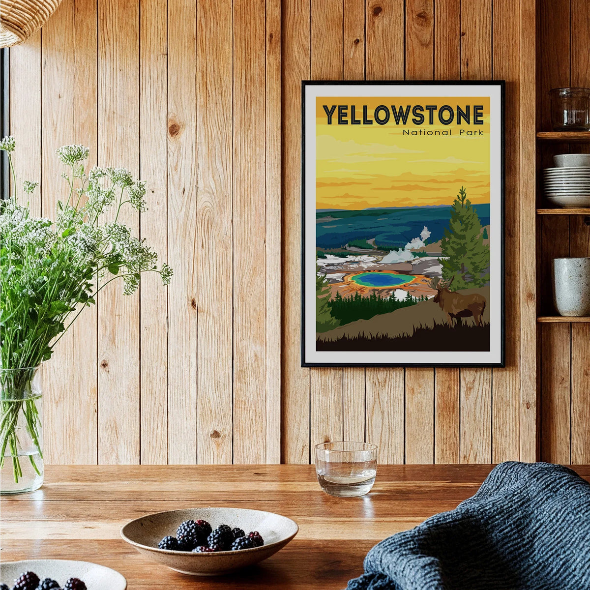 Yellowstone National Park art print in black frame on wooden kitchen wall, rustic decor