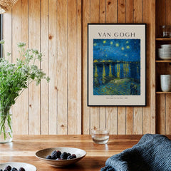 Vincent van Gogh Starry Night Over the Rhône 1888 Post Impressionist Landscape Poster Print displayed in a cozy setting.