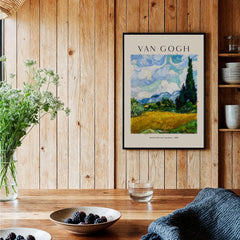 Vincent van Gogh Wheat Field with Cypresses 1889 Landscape Art Print Post Impressionist Poster displayed in a rustic home setting.