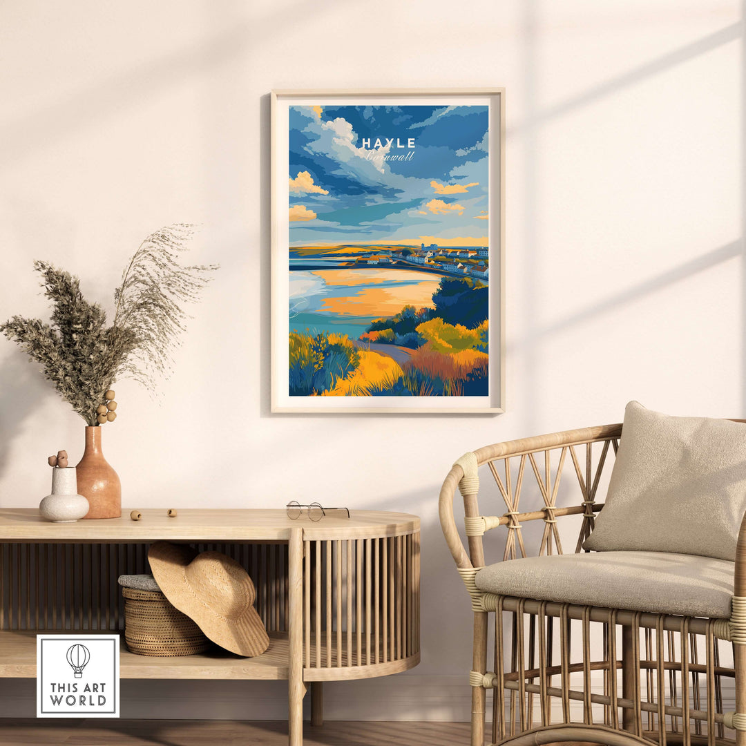 Hayle Cornwall coastal landscape poster displayed in a modern interior setting with a rattan chair and decor.