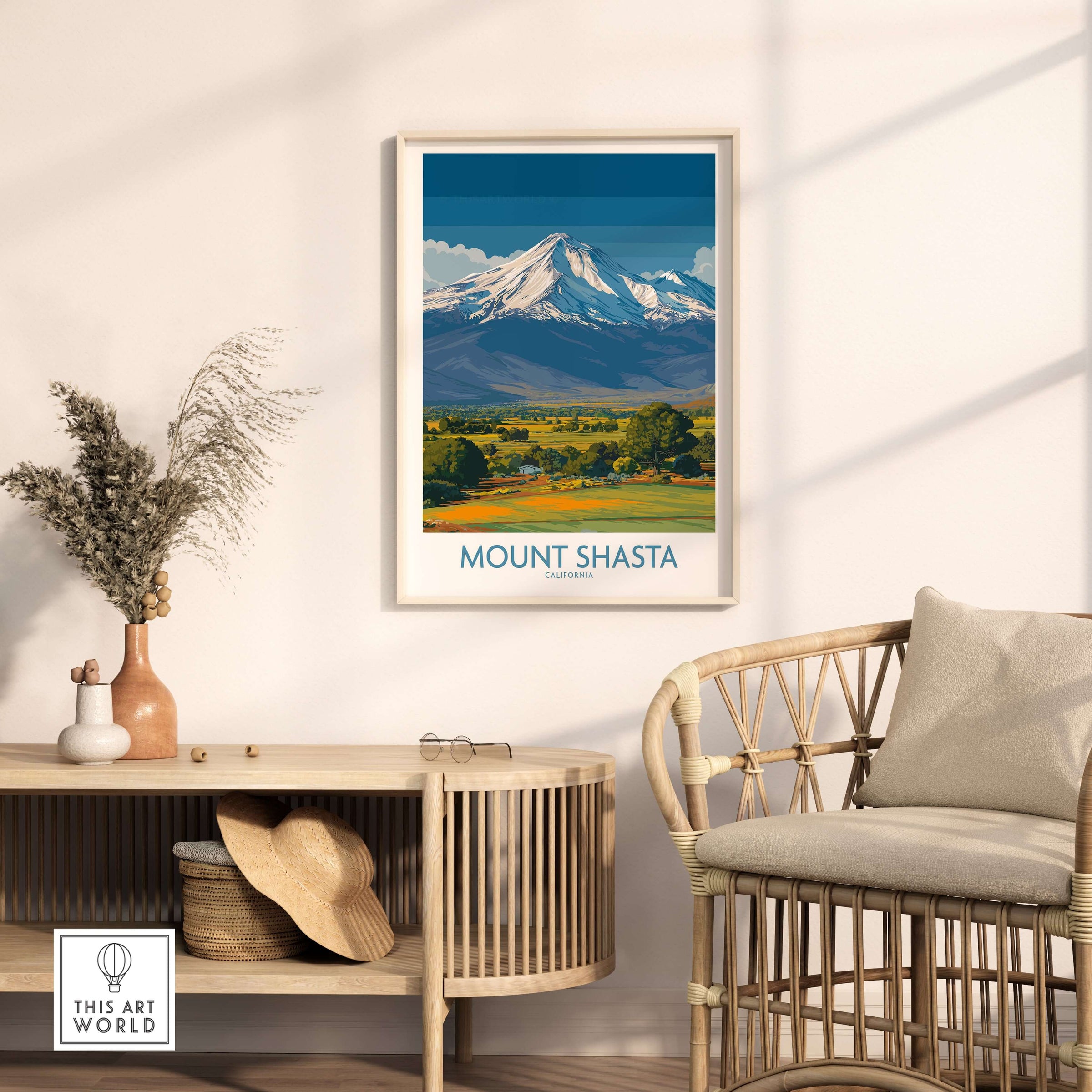 Mount Shasta California Poster displayed in cozy living room setting with greenery and rattan furniture.