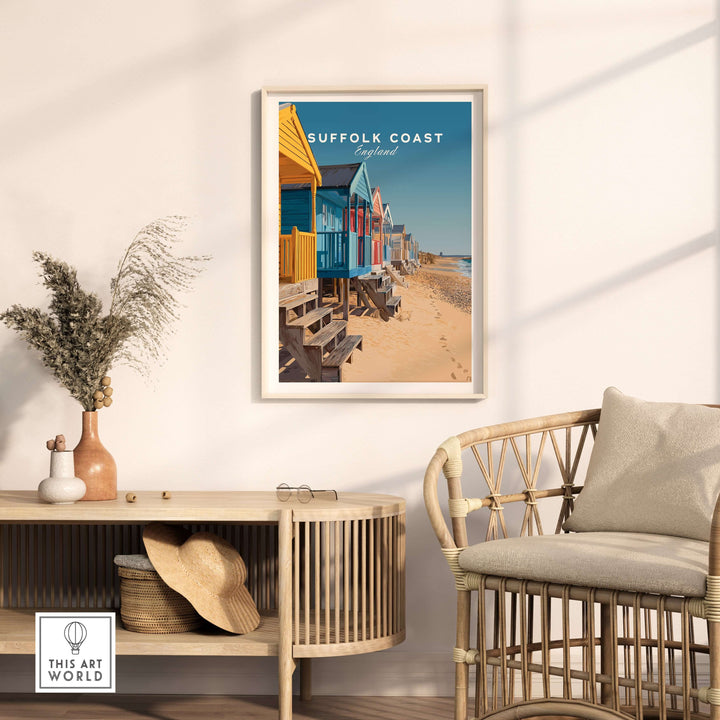 Vibrant Suffolk Coast beach huts poster in a modern living room setting, showcasing colorful seaside decor.