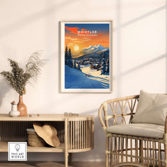 Whistler Wall Art Ski Print showcasing a vibrant sunset over ski slopes in a cozy home setting.