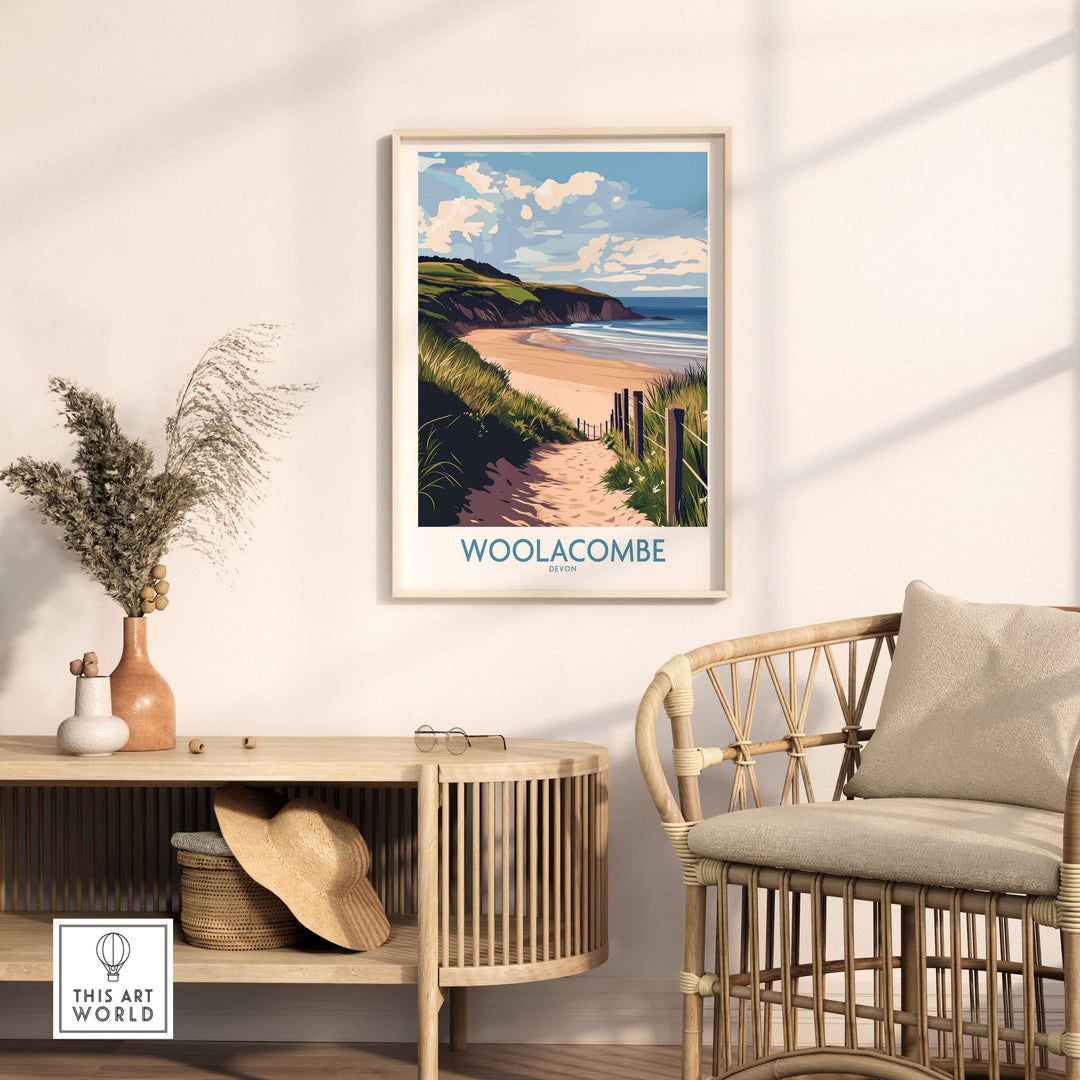 Woolacombe Devon poster showcasing a beach path, ocean view, and coastal decor in a stylish living room setting.