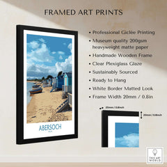 Abersoch Wales Beach Huts Art Print | Coastal Boats Wall Decor Poster displayed in a black frame with seaside imagery.
