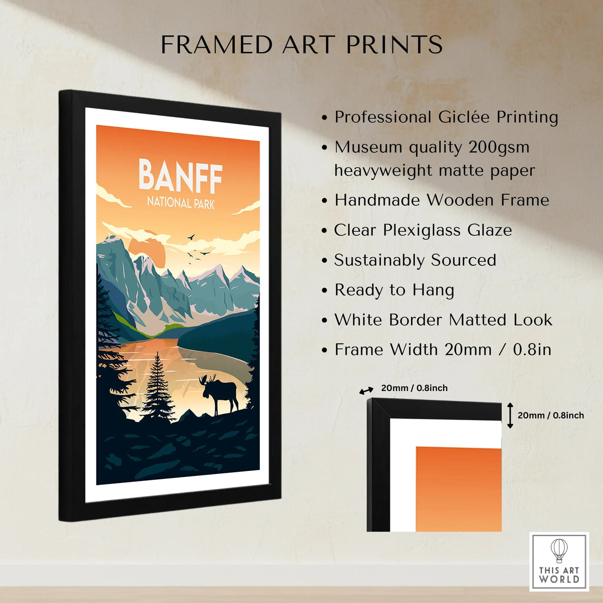 Framed Banff National Park travel poster print with mountains, lake, trees, and moose.