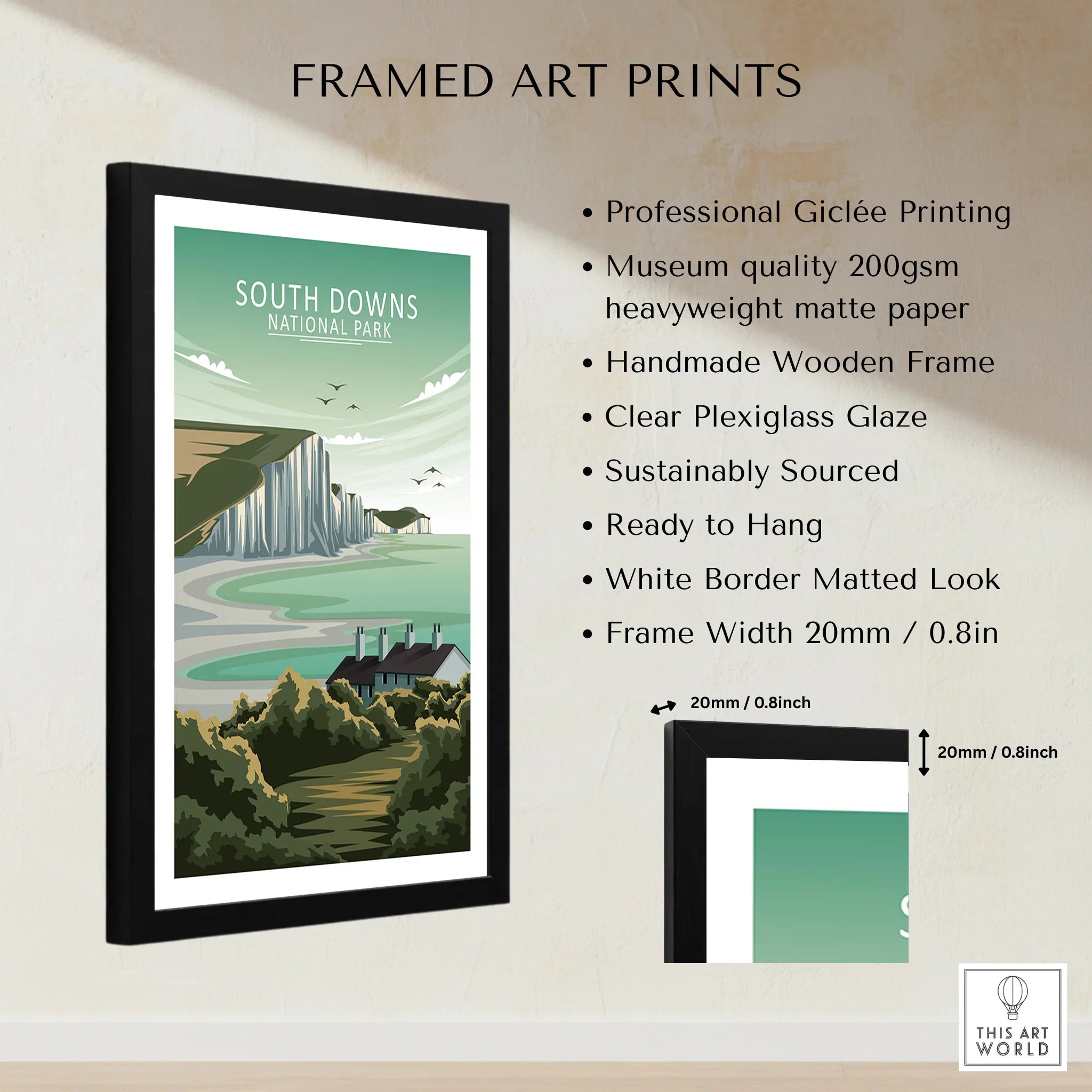 Framed South Downs National Park print with coastal cliffs, cottage, and lush greenery.