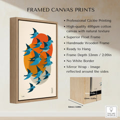 Framed canvas print with blue birds, orange and beige shapes, in a wooden float frame.