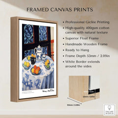 Matisse Art Prints - Still Life Blue Tablecloth Poster displayed in a wooden frame, showcasing vibrant fruit and teapot design.