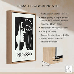 Picasso The Kiss 1979 Black White Abstract Profile Poster Art Print Wall Decor framed in a wooden frame with a white border.
