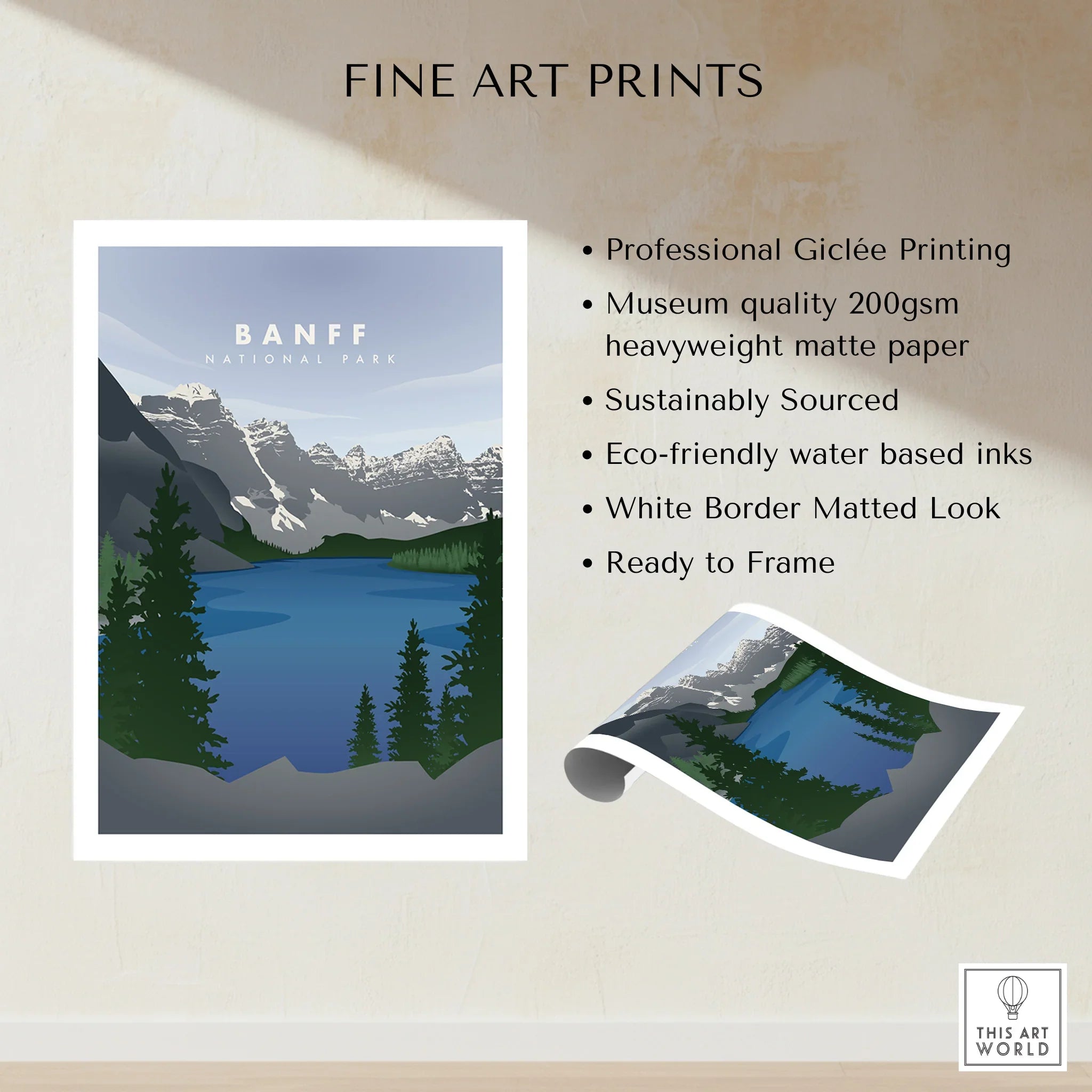 Banff National Park fine art print with snowy mountains, pine trees, blue lake, and white border
