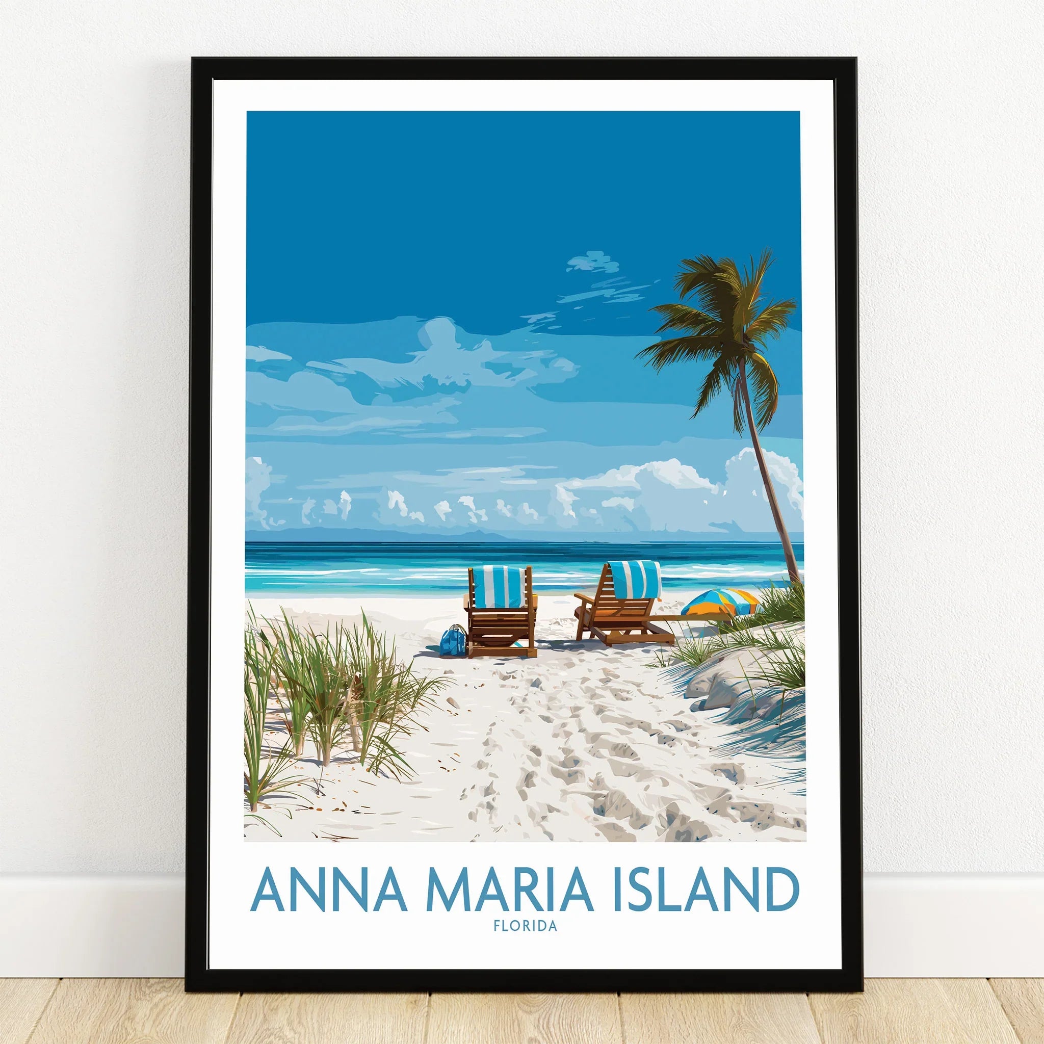 Anna Maria Island art print in black frame, beach scene with chairs, palm, and ocean view