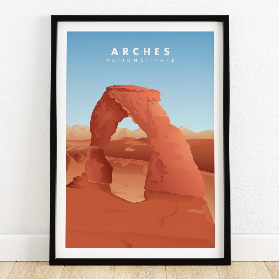 Arches National Park print in black frame on wooden floor, desert landscape illustration