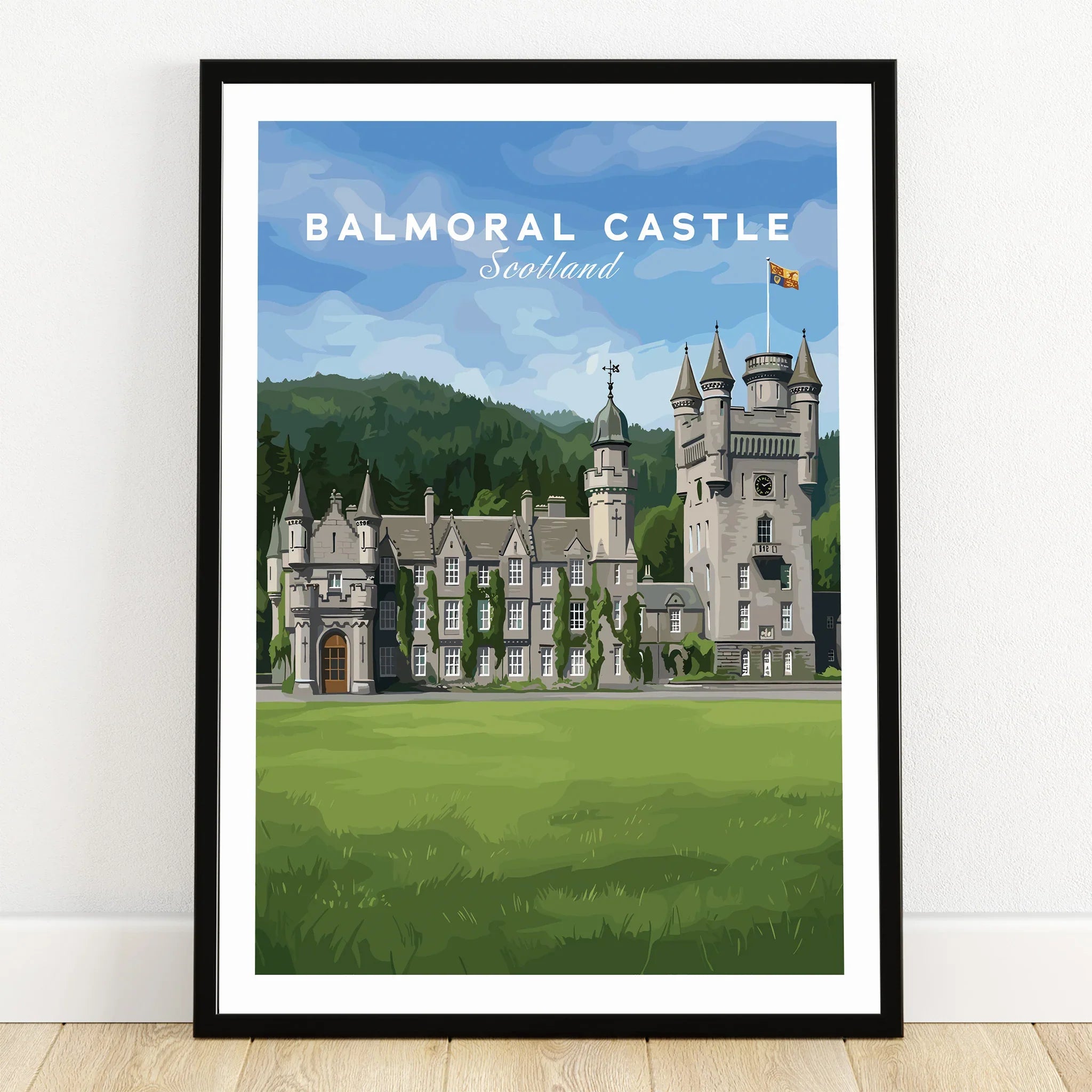 Balmoral Castle art print in black frame on wooden floor, travel poster style wall decor