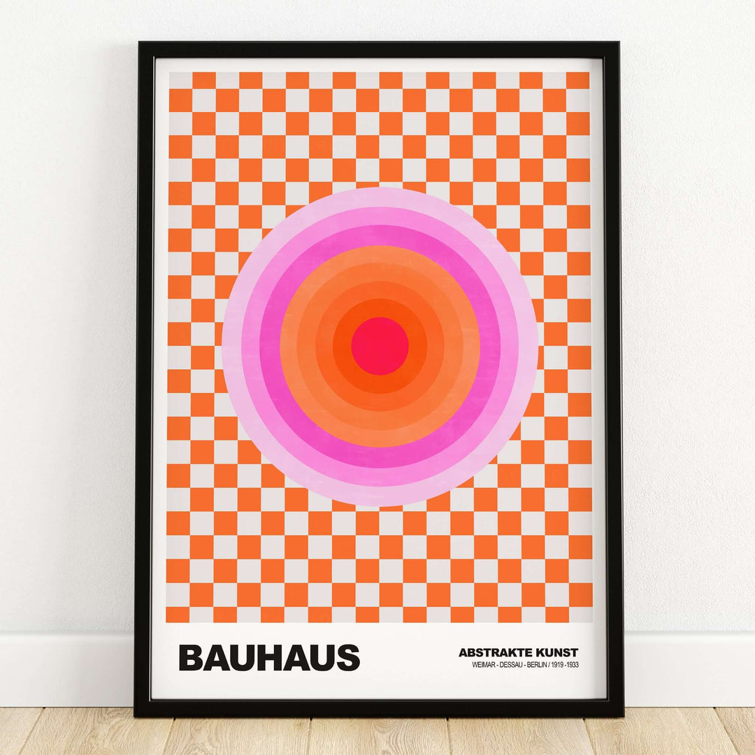 Bauhaus Exhibition Prints - Pink Circles Poster Orange Checkerboard Art framed in a modern setting with vibrant colors.