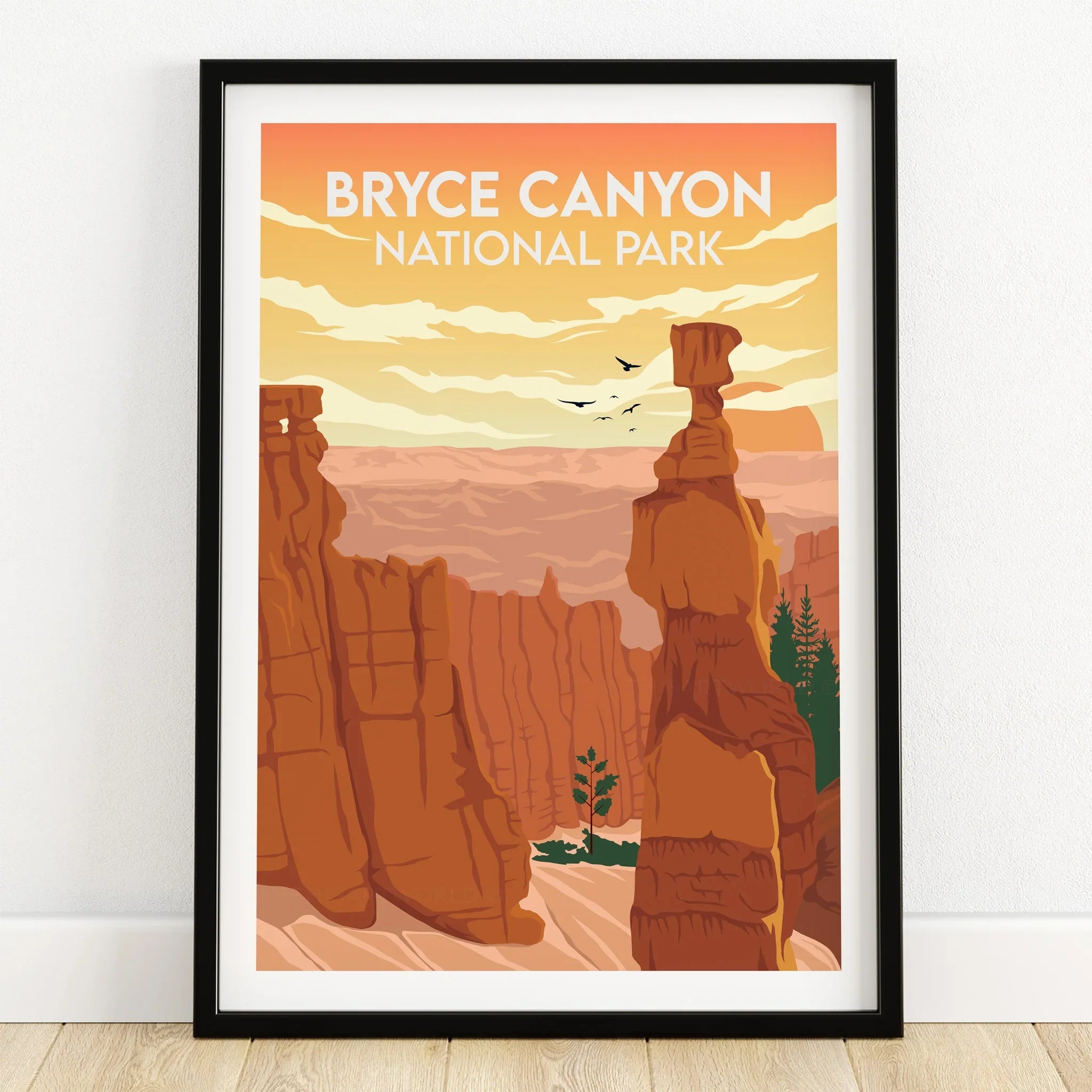 Bryce Canyon National Park art print in black frame with orange rock formations and sunrise sky