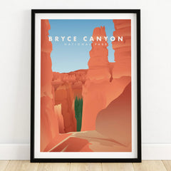 Bryce Canyon National Park art print in black frame on wooden floor, red rock landscape.