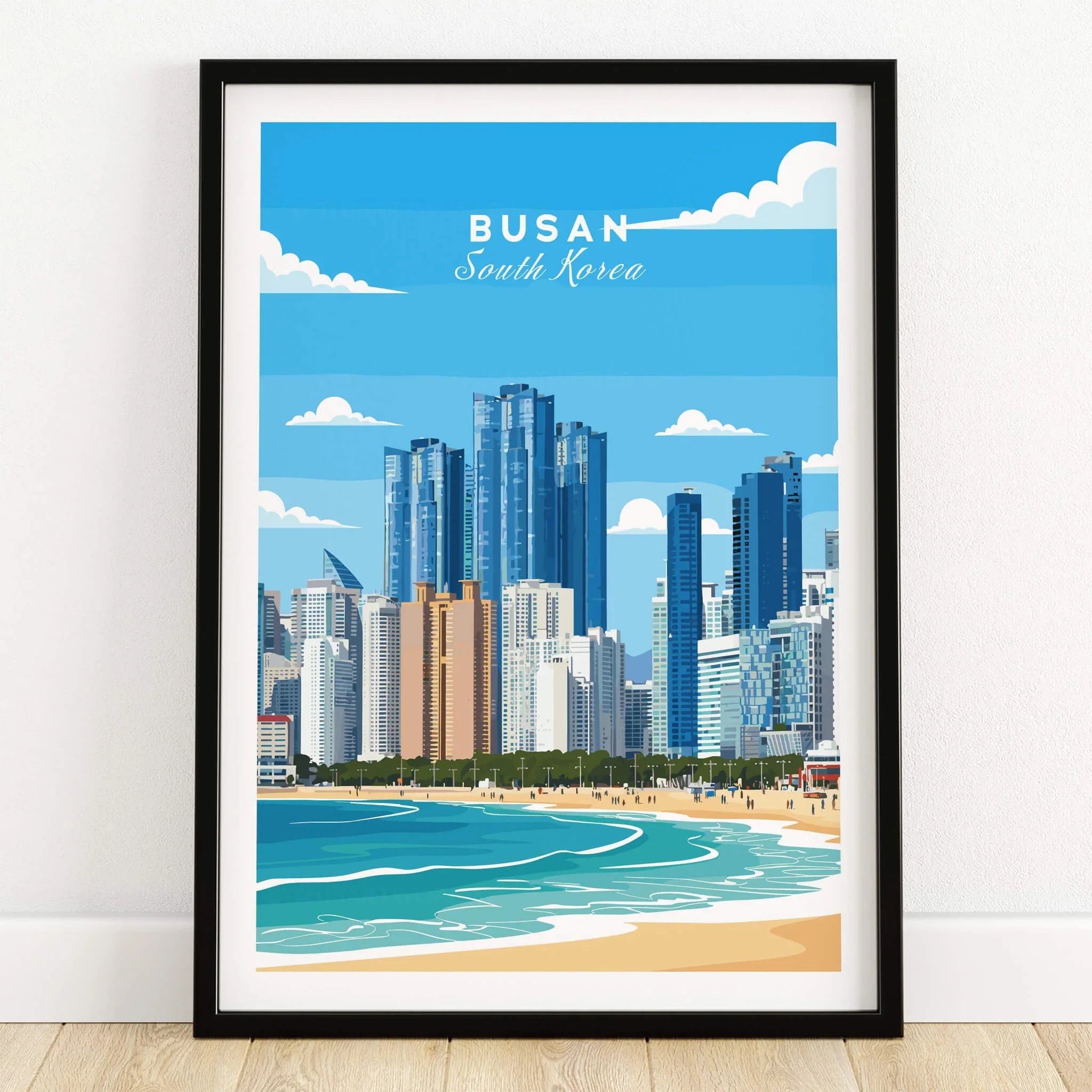 Busan city skyline art print with beach, framed and displayed on wooden floor