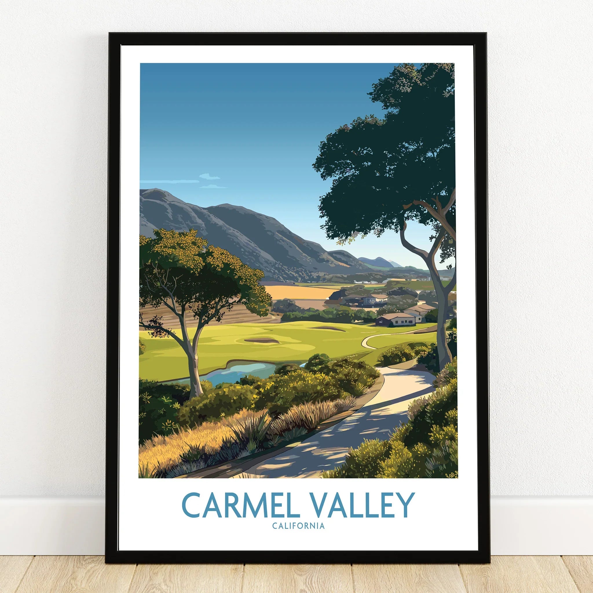 Carmel Valley California travel poster art print in black frame on wooden floor