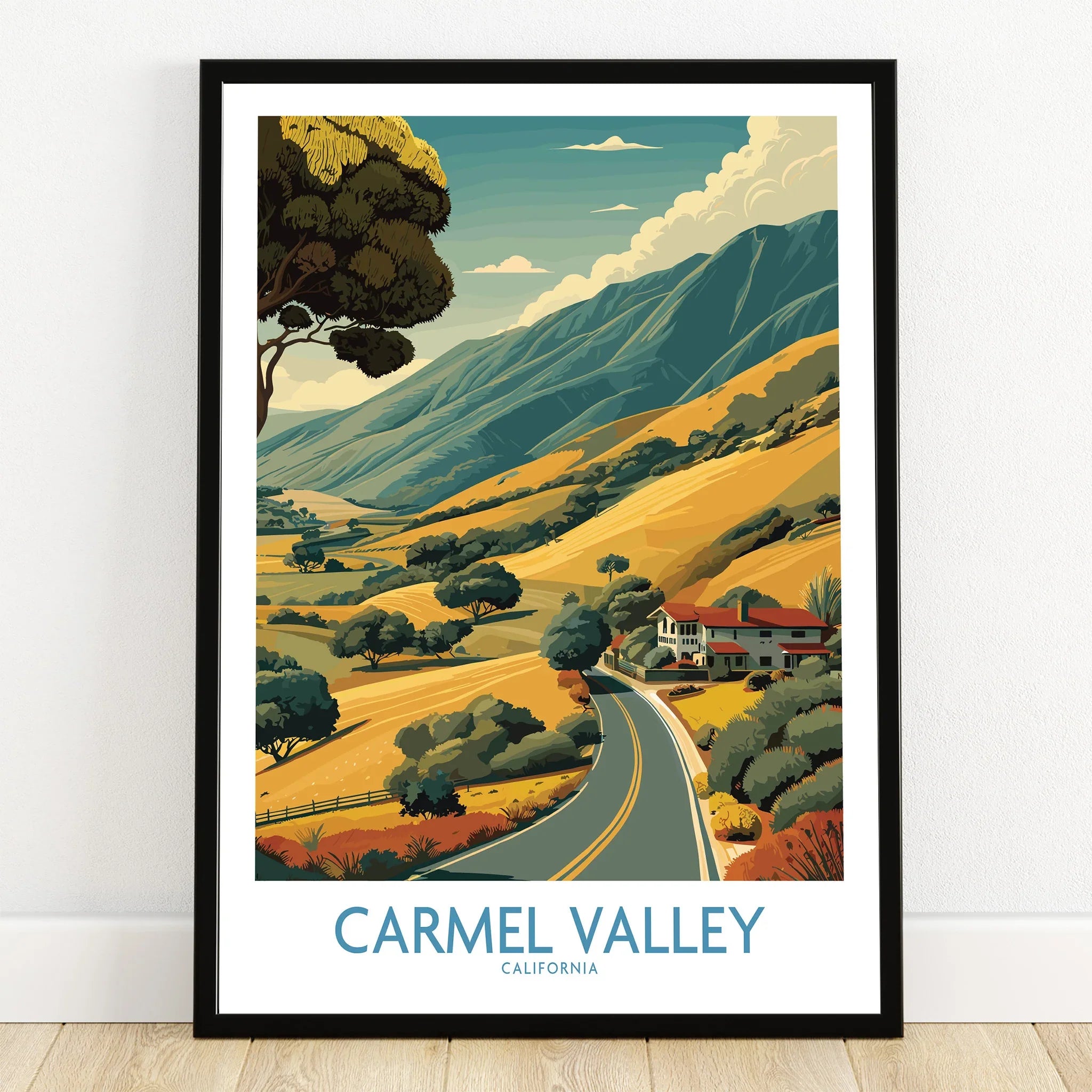 Carmel Valley art print in black frame, showing scenic road, hills, and trees landscape.