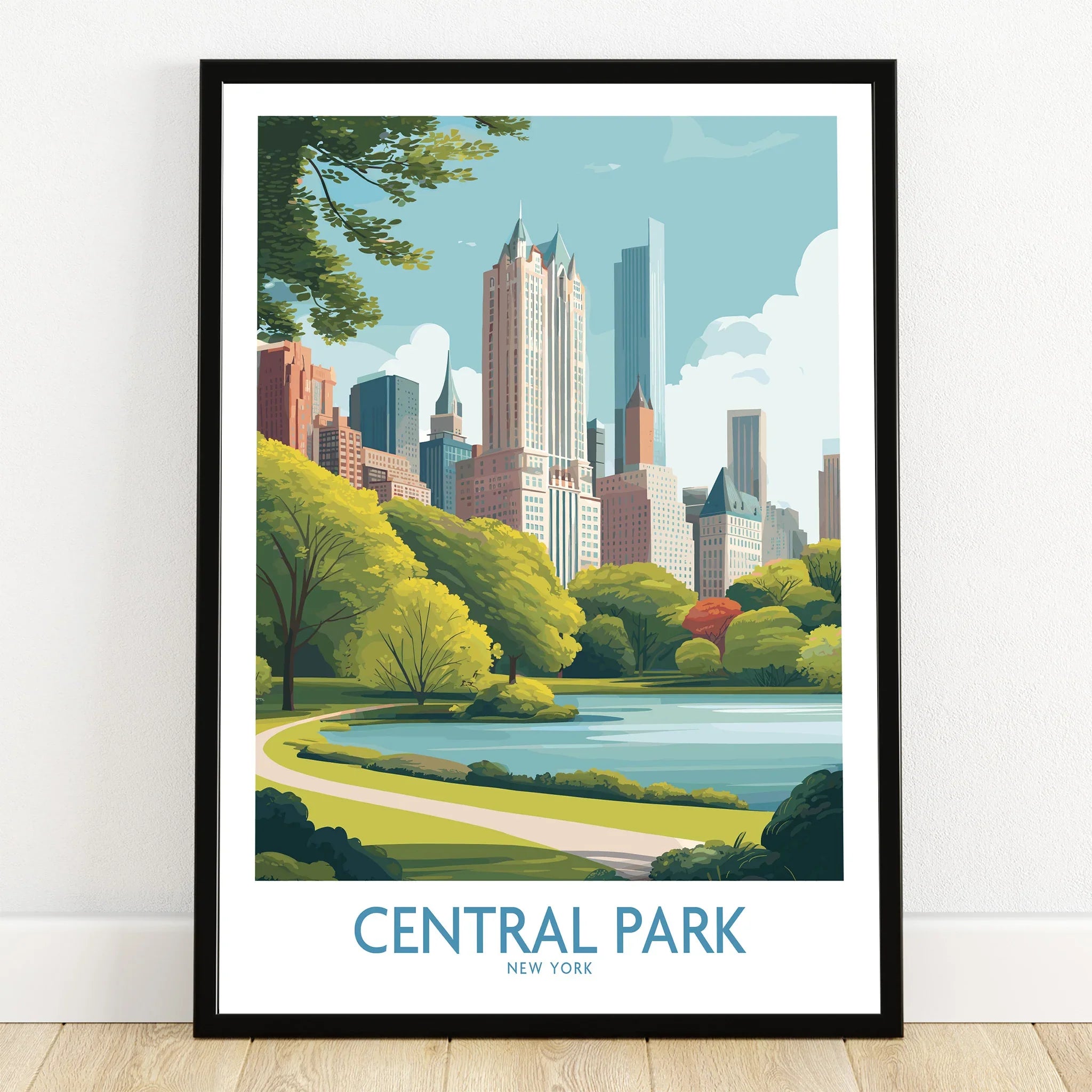 Central Park art print with New York skyline in black frame on wooden floor