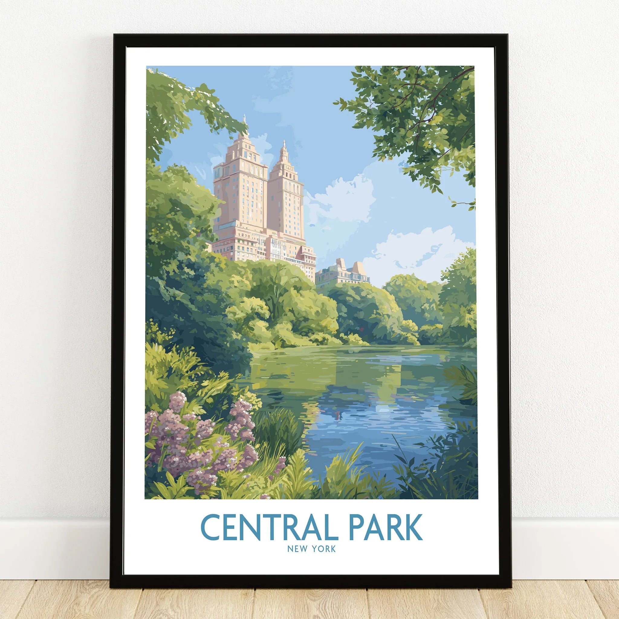 Central Park art print in black frame showing lake, greenery, and New York skyline