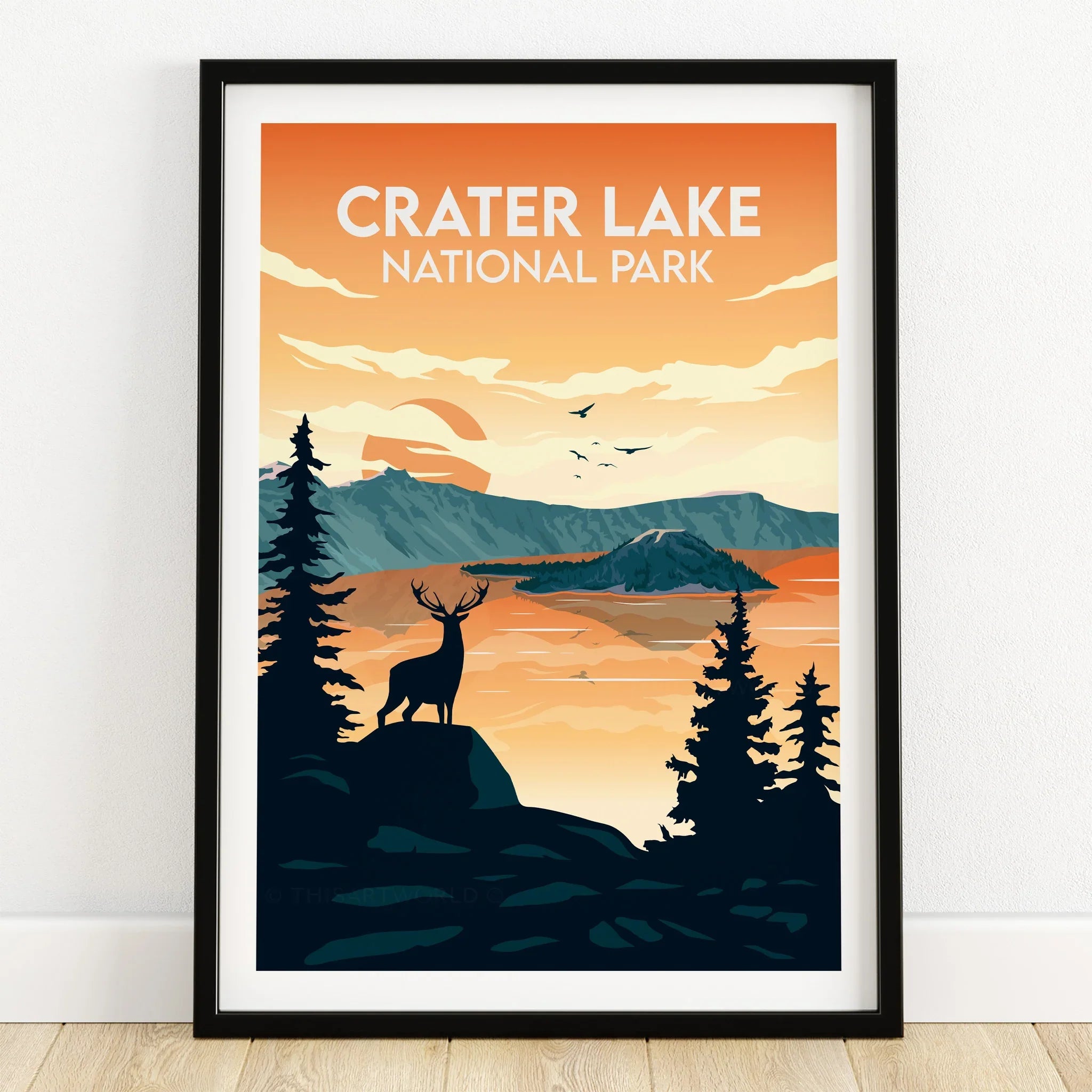 Crater Lake National Park art print with silhouette deer, forest, and sunset colors in black frame.