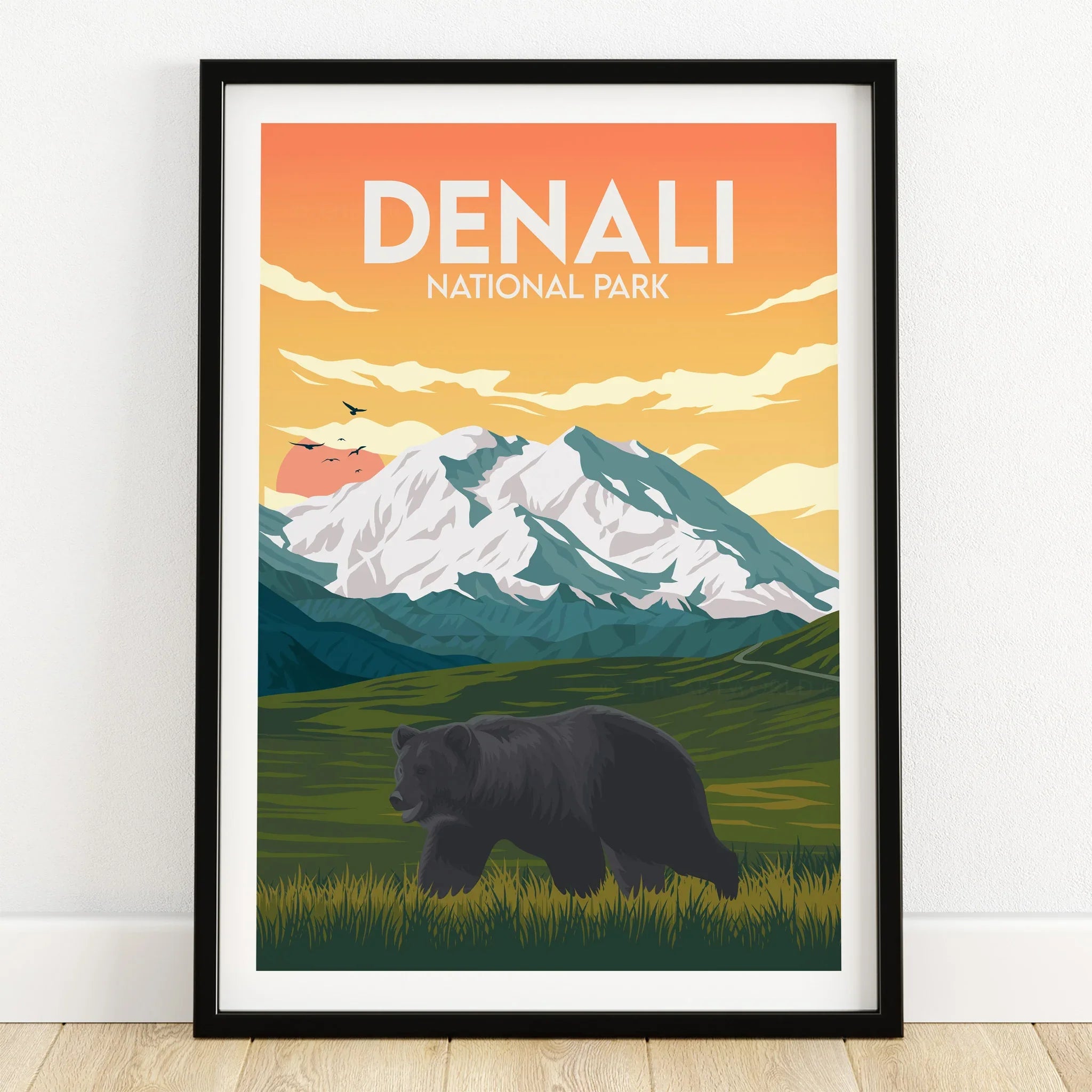 Denali National Park art print with bear, mountain landscape, and orange sunset in black frame