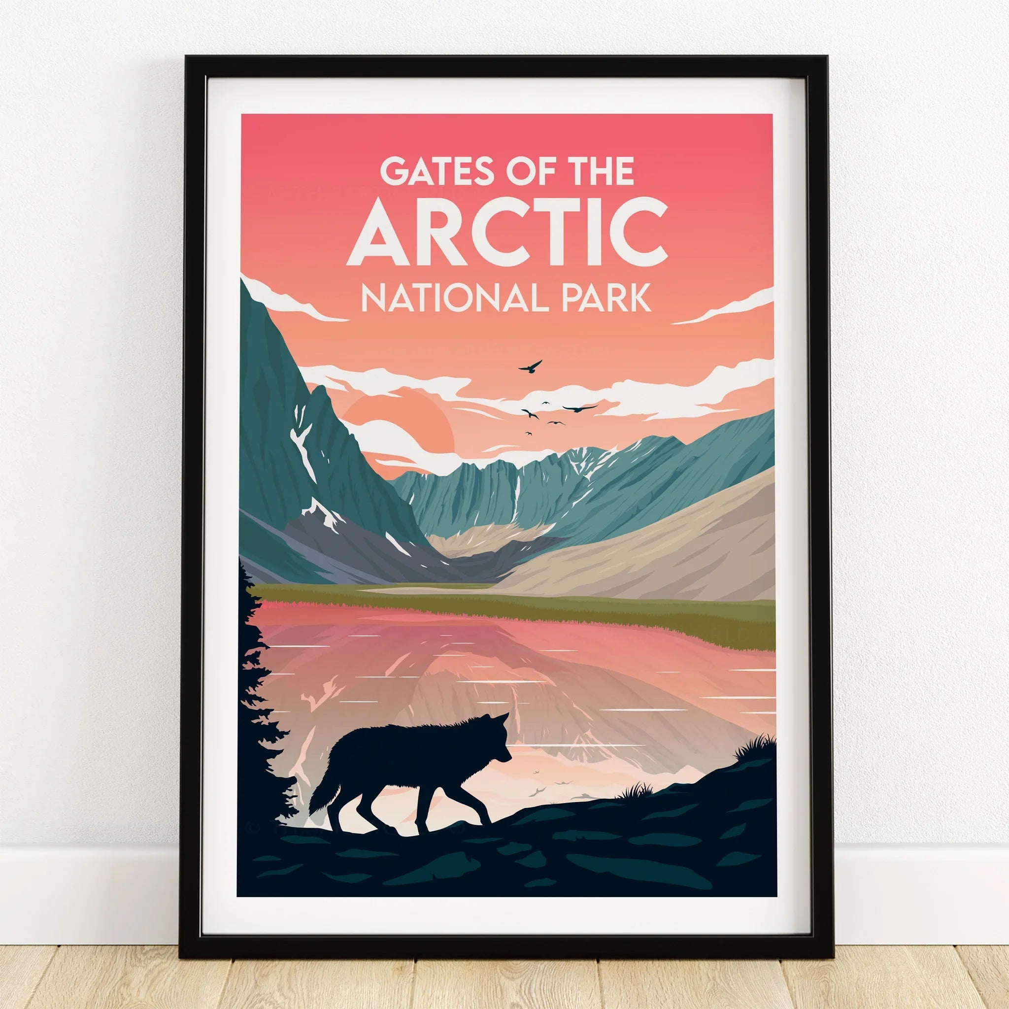 Gates of the Arctic National Park print with wolf silhouette, mountains, and sunrise reflection in black frame