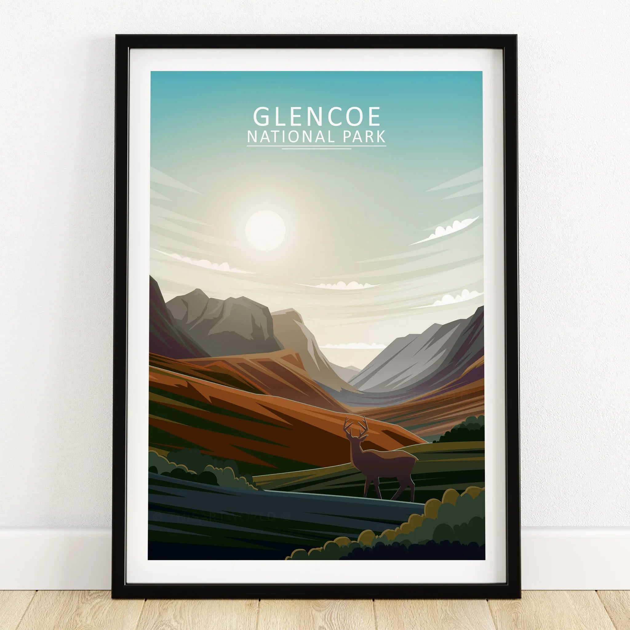 Glencoe National Park art print in black frame, featuring a scenic mountain landscape and deer.