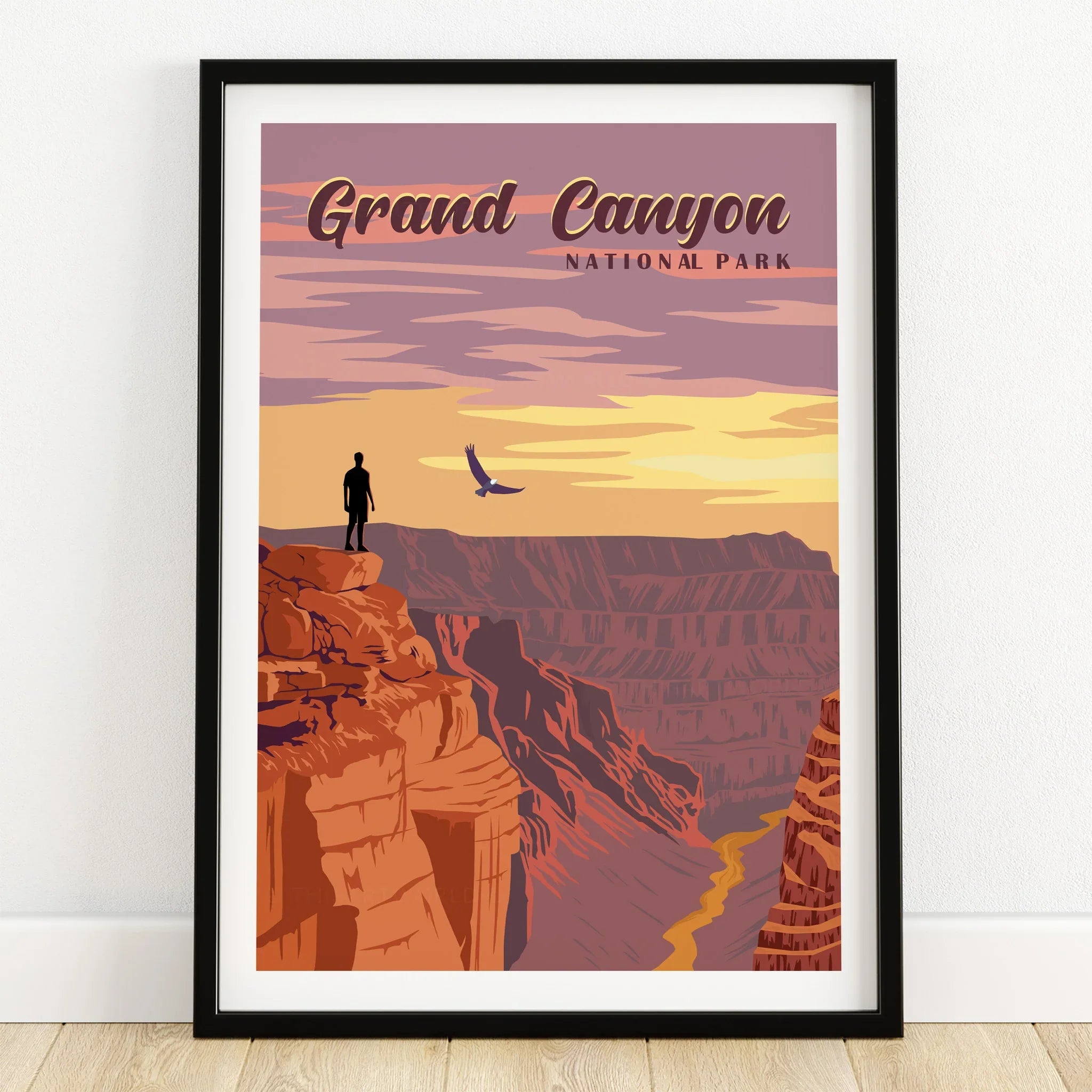 Grand Canyon National Park art print with sunset, canyon cliffs, and hiker in black frame