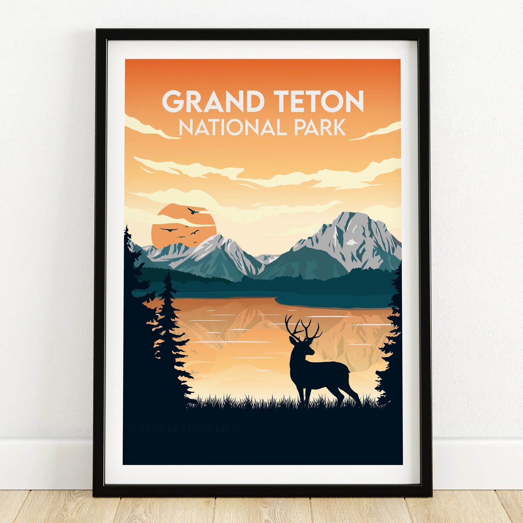 Grand Teton National Park art print with deer, sunset, mountains, and lake in black frame