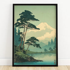 Framed Japanese woodblock art print of Mount Fuji with pine trees and lake reflection