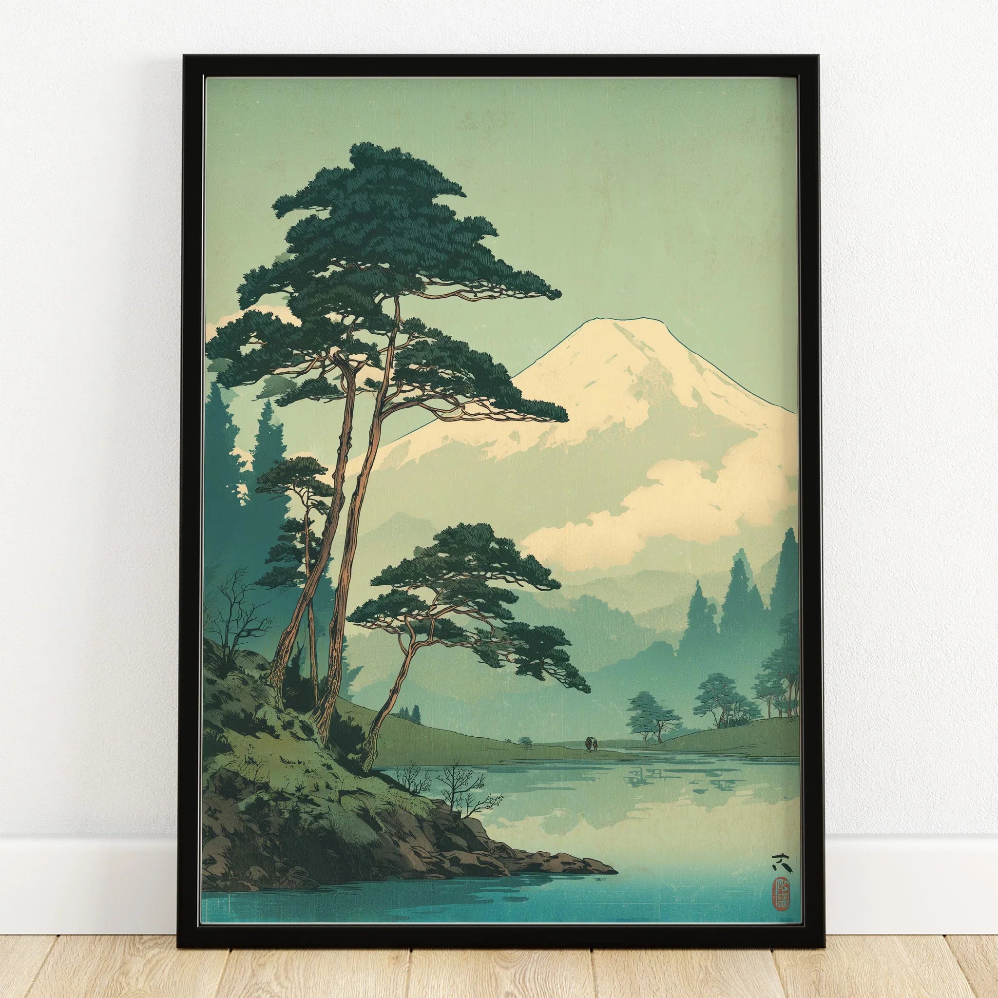 Framed Japanese woodblock art print of Mount Fuji with pine trees and lake reflection