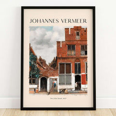 Johannes Vermeer The Little Street 1657 Delft Scene Dutch Golden Age Art Print framed on a wall showcasing 17th-century architecture.