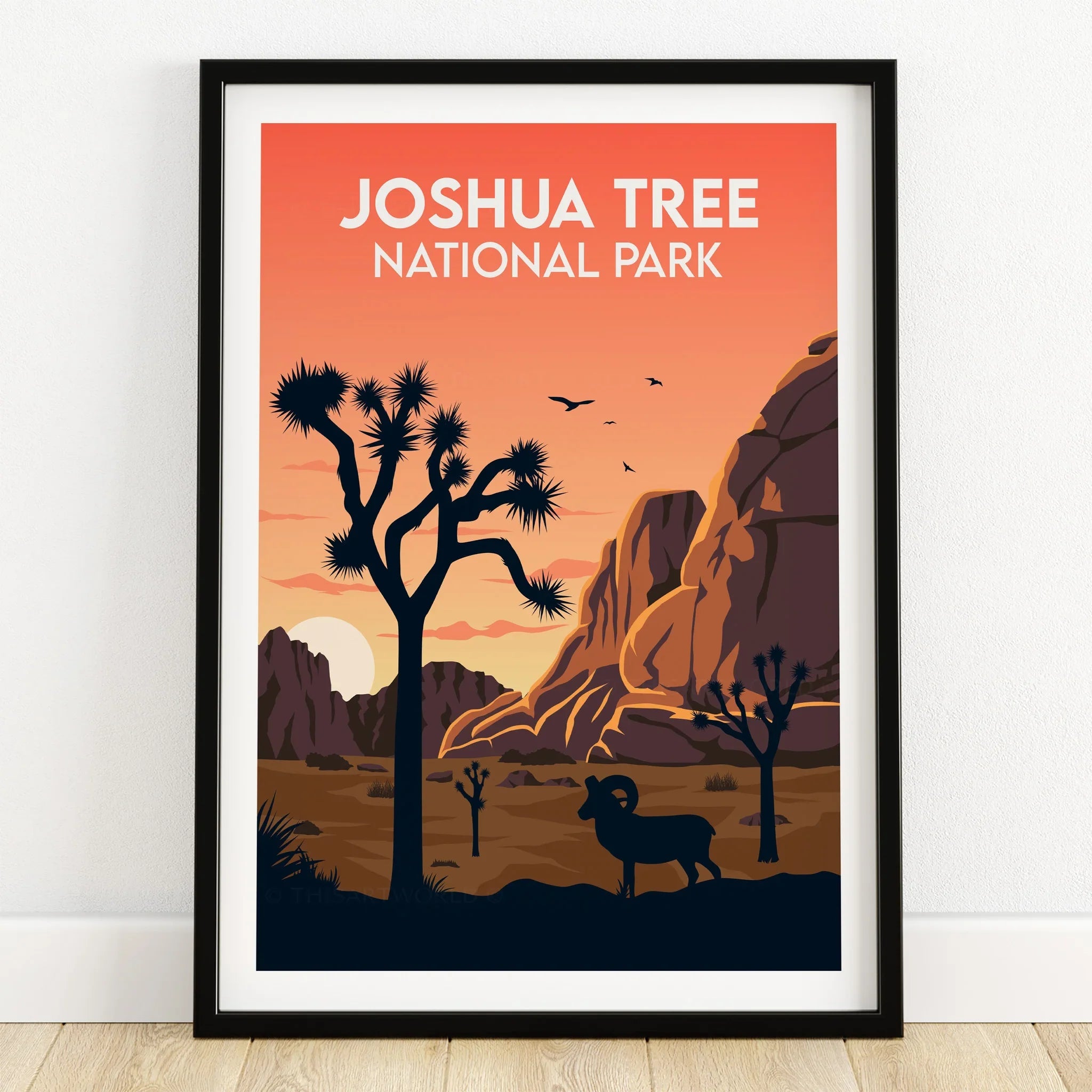 Framed Joshua Tree National Park art print with sunset, desert, and bighorn sheep.