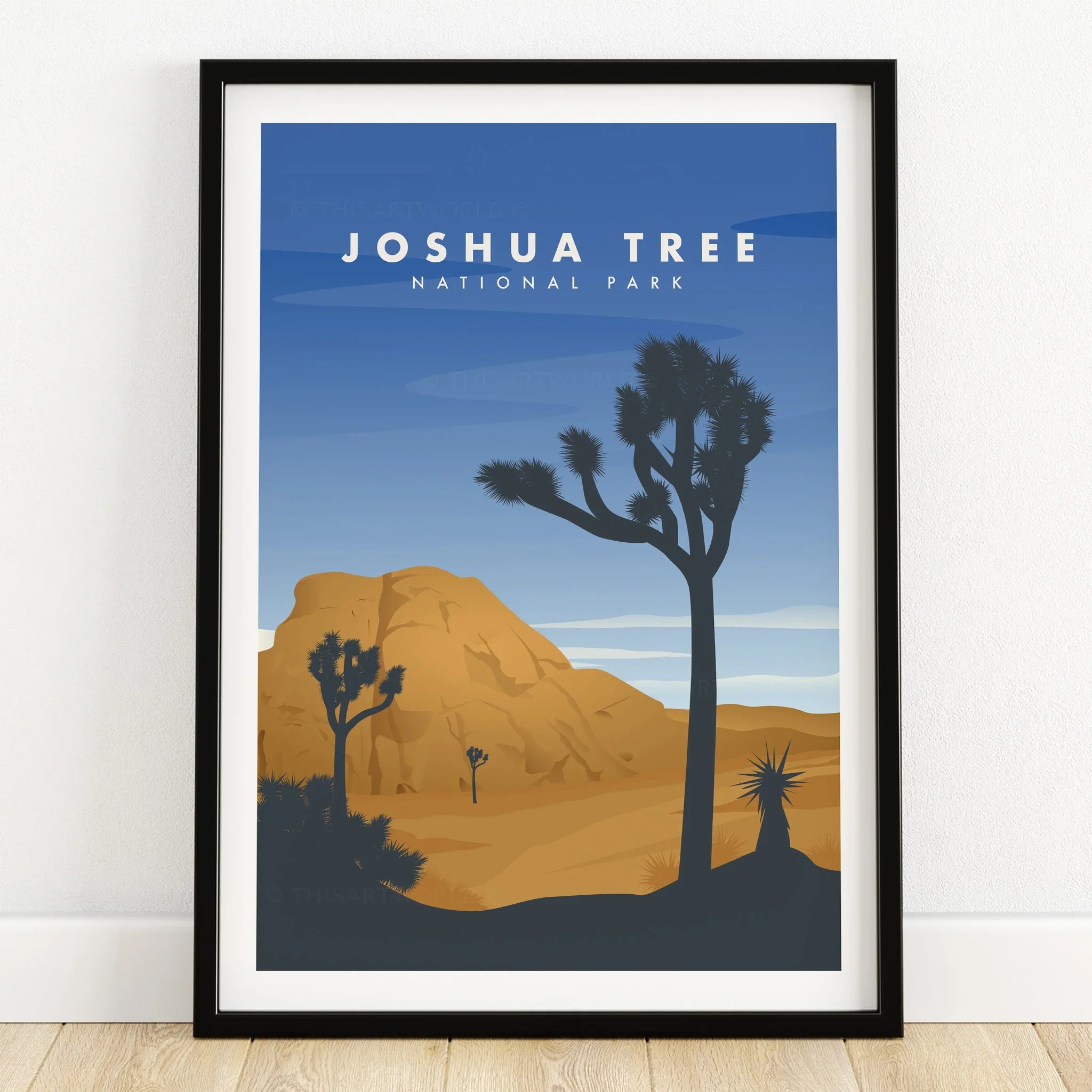 Joshua Tree National Park art print in black frame with desert landscape and blue sky