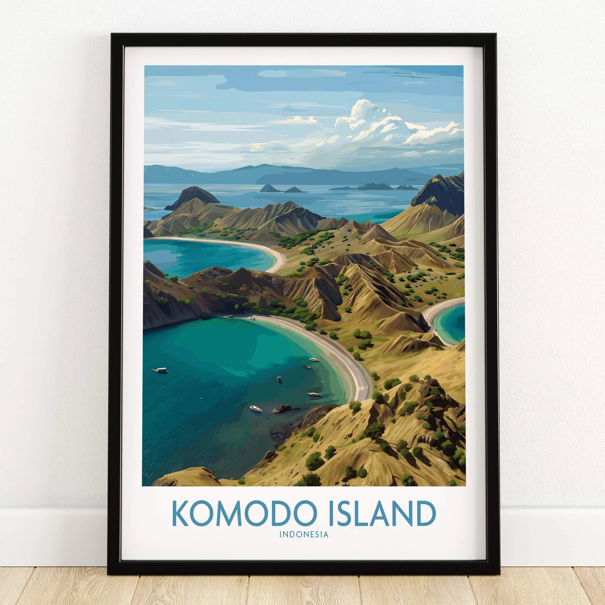 Komodo Island travel poster in black frame on wooden floor, featuring scenic coastal landscape art.