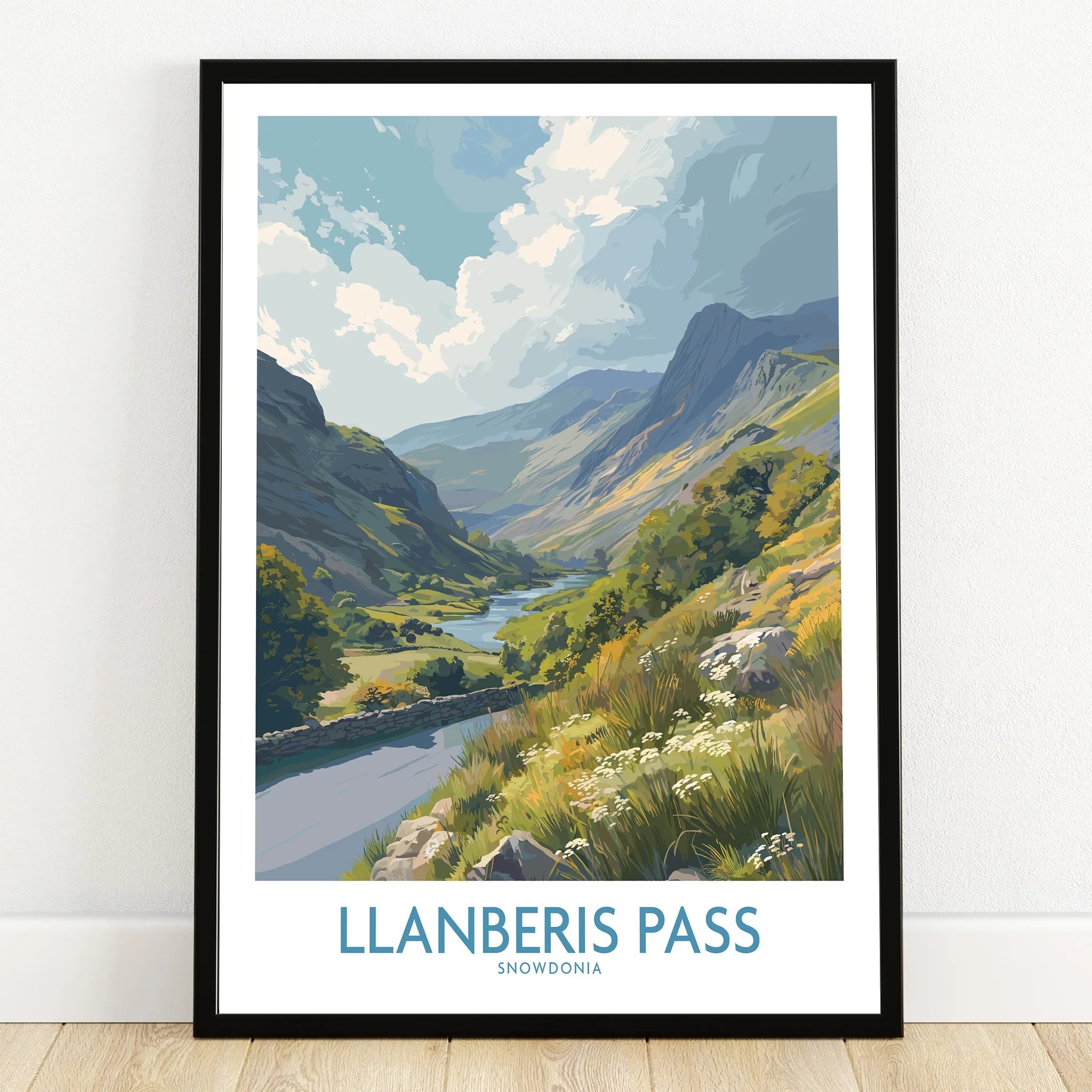Llanberis Pass Snowdonia art print in black frame, landscape wall decor on wooden floor