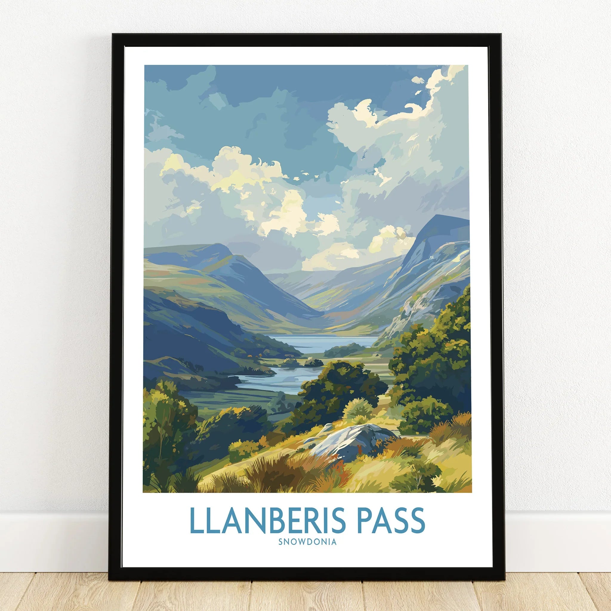 Llanberis Pass Snowdonia art print in black frame, landscape wall art on wooden floor