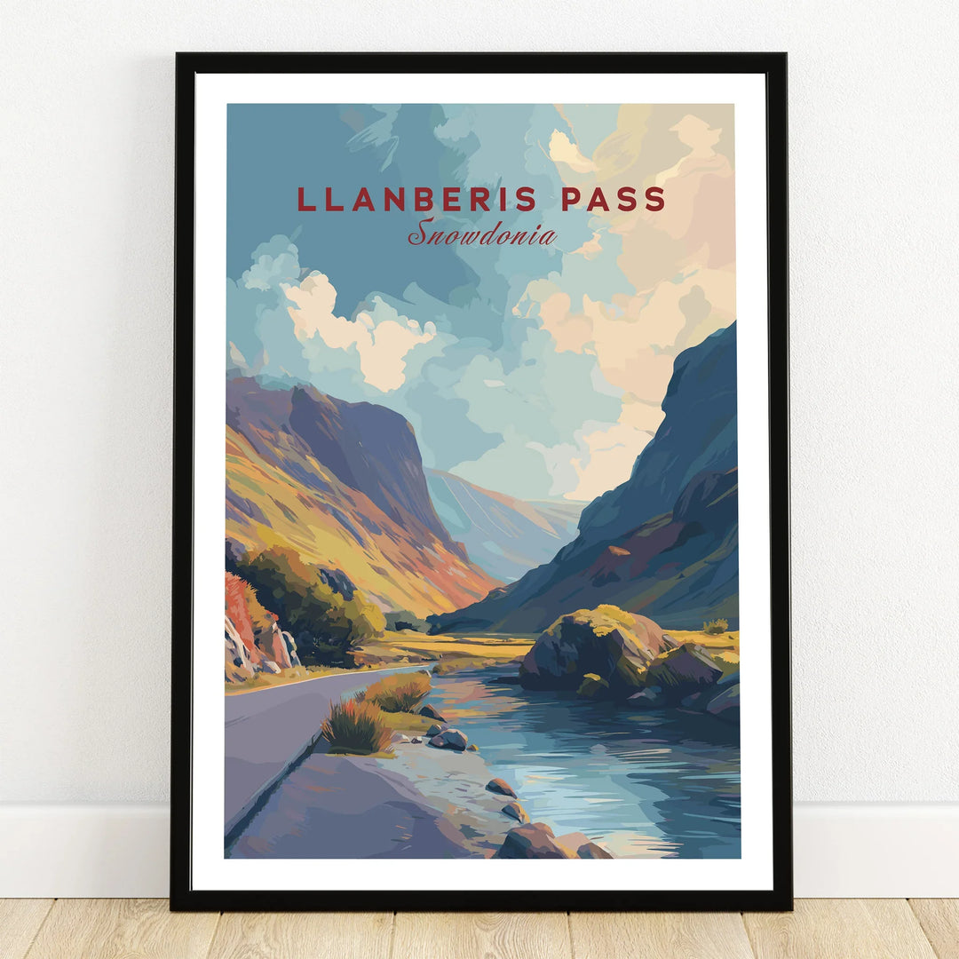 Framed Llanberis Pass Snowdonia travel art print with mountains and river landscape on wooden floor