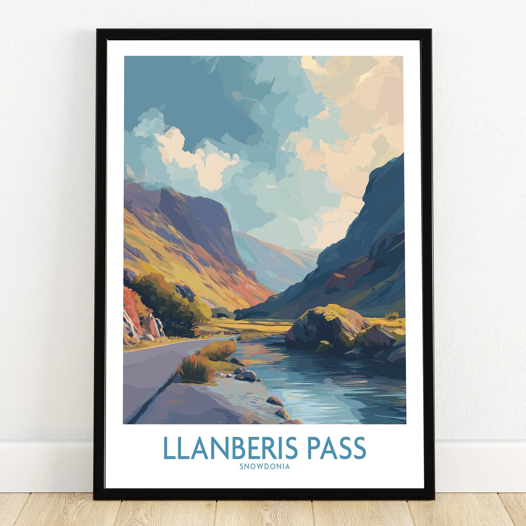 Llanberis Pass art print in black frame, featuring Snowdonia mountain landscape and river.