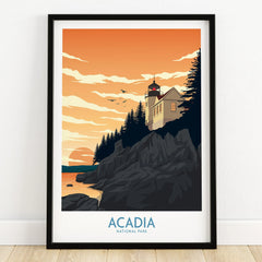 Acadia National Park art print in black frame, featuring a coastal lighthouse at sunset.