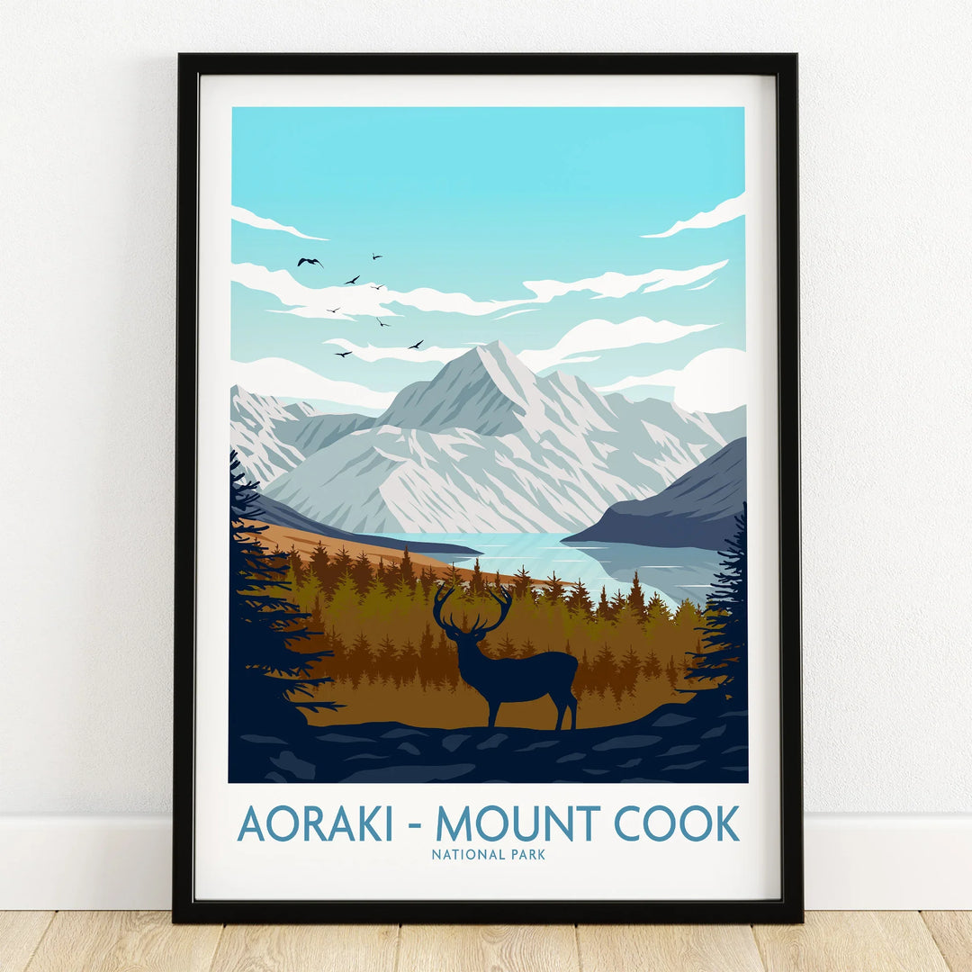 Aoraki Mount Cook National Park art print in black frame, showing mountains, lake, trees, and a deer silhouette