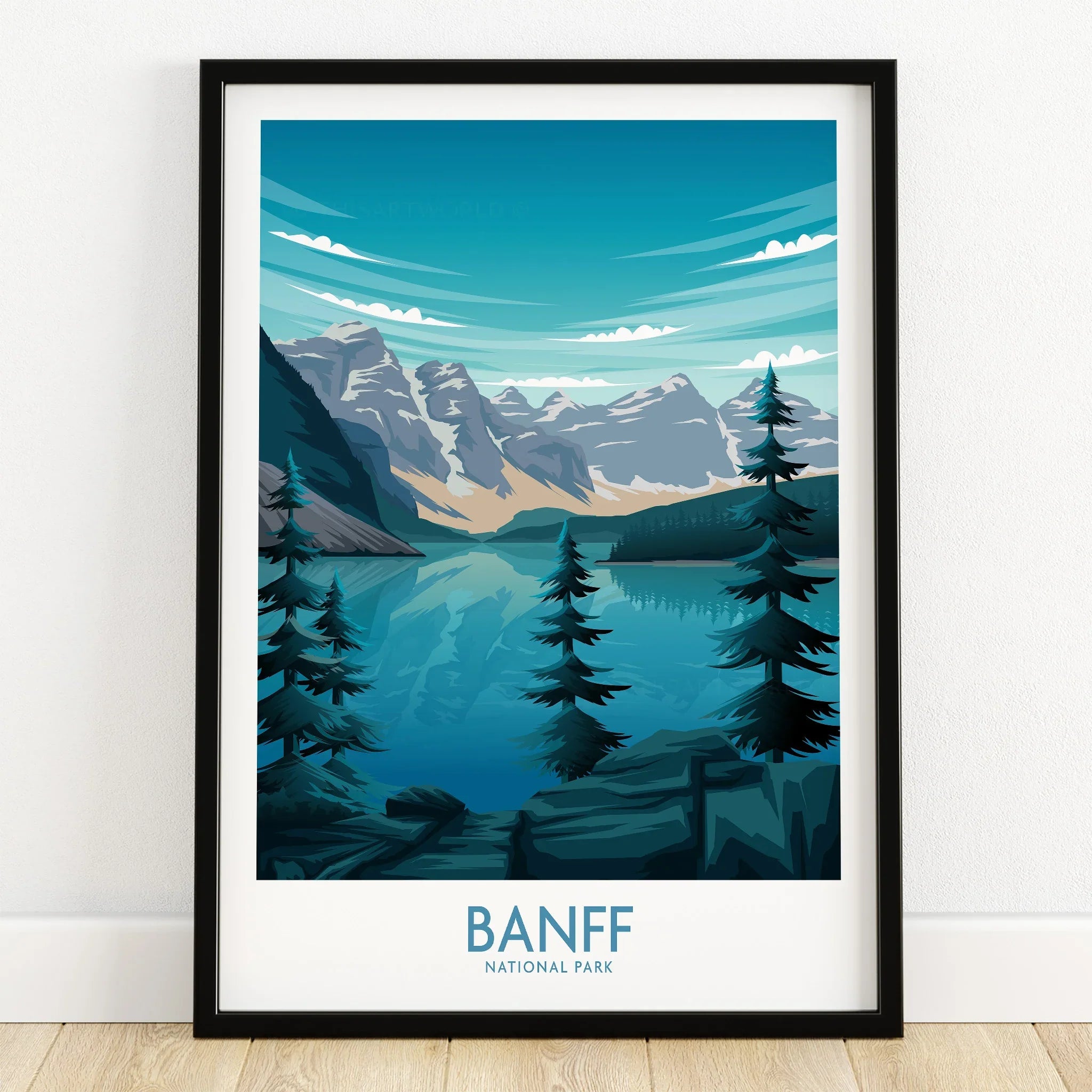 Banff National Park art print in black frame, featuring mountains, lake, and pine trees