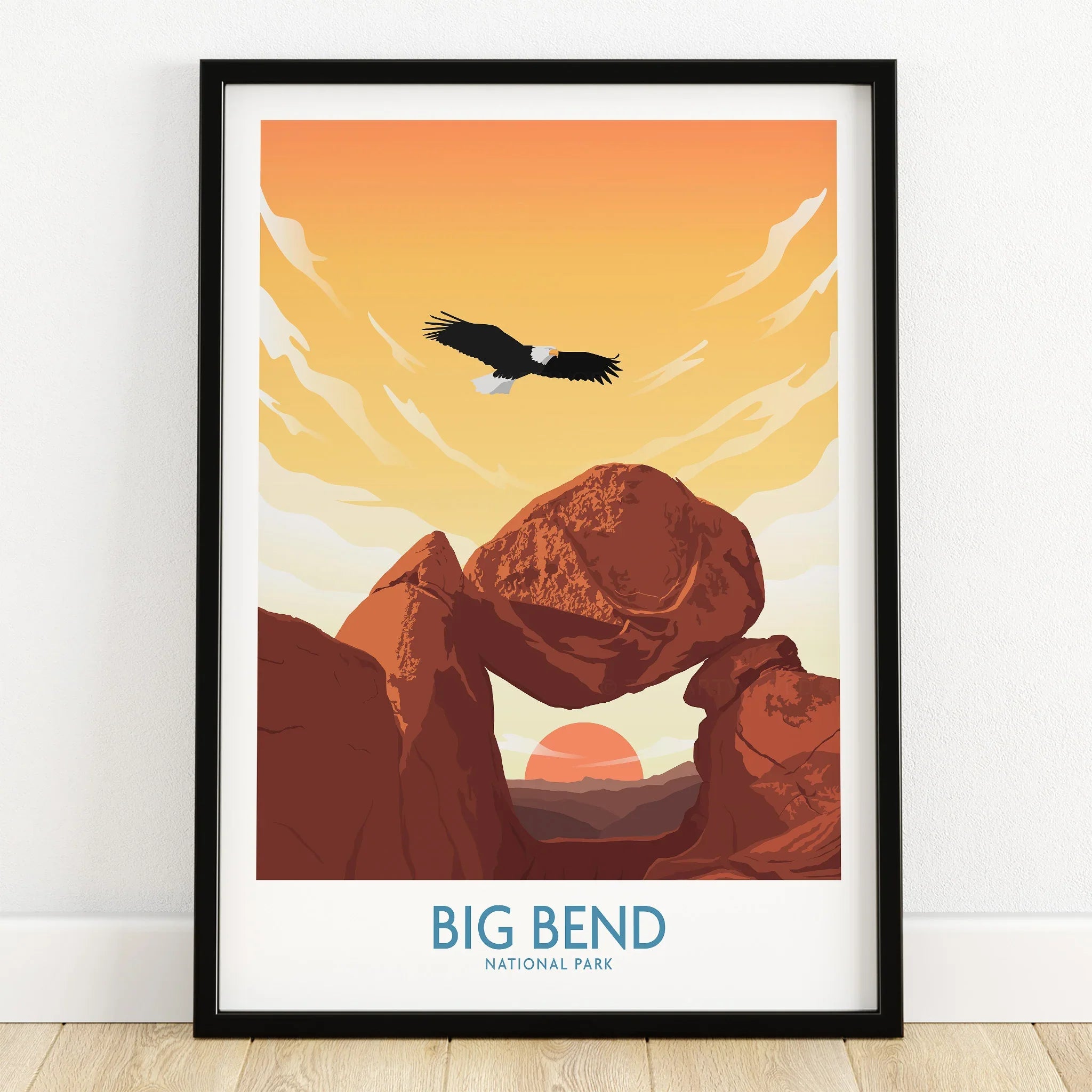 Big Bend National Park art print in black frame, with sunset, rock formations, and flying eagle.