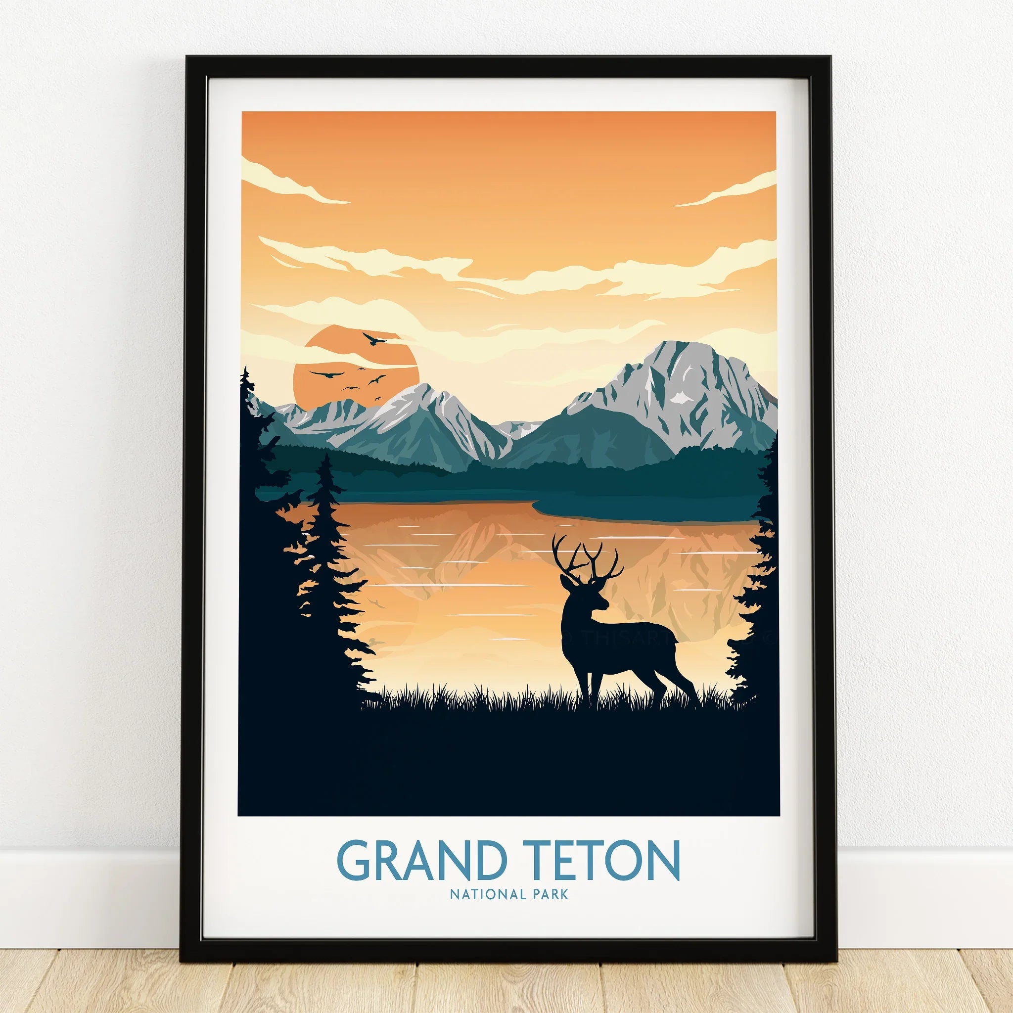 Grand Teton National Park art print with deer, mountains, sunset, and lake in black frame