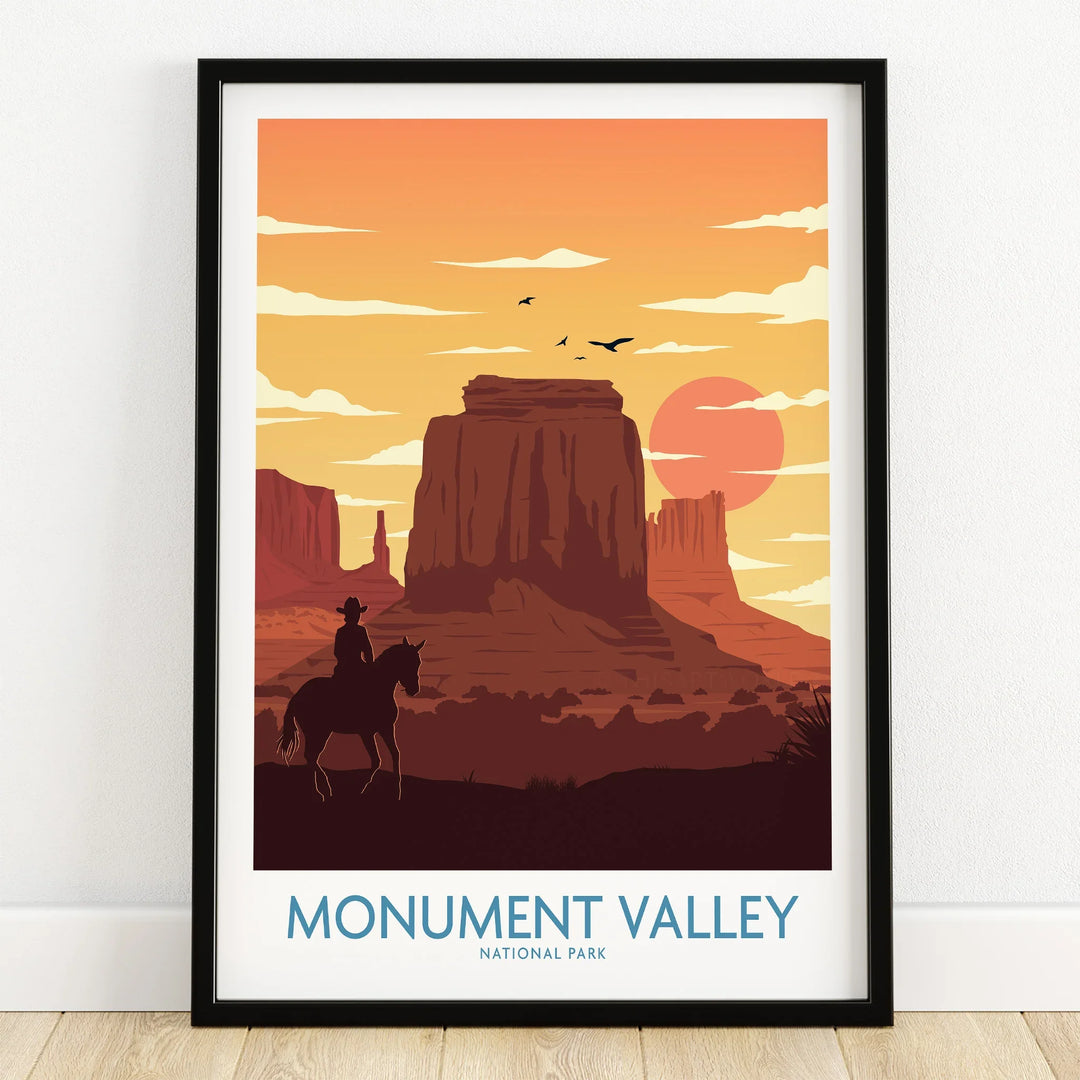 Monument Valley art print in black frame, sunset scene with buttes and cowboy silhouette