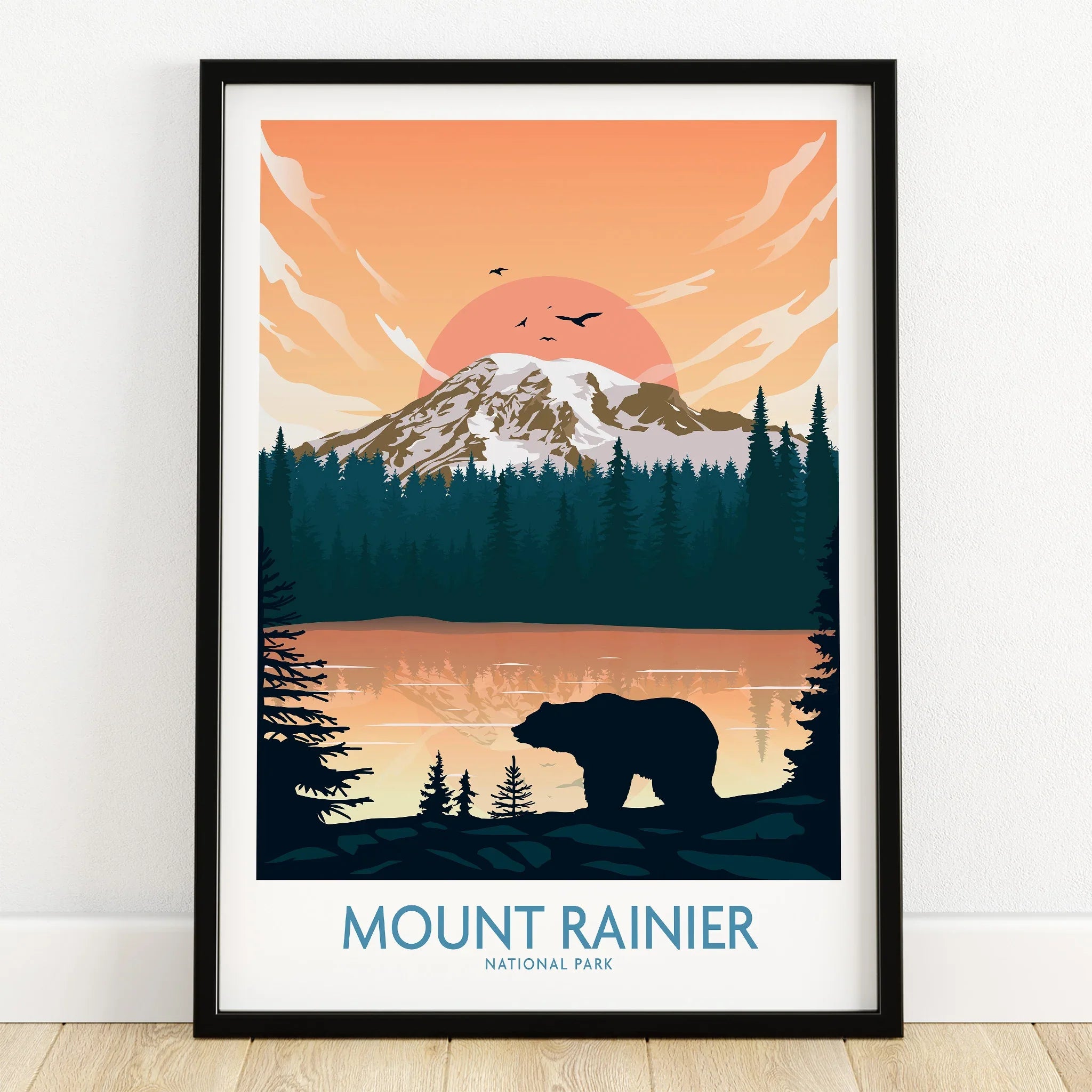 Mount Rainier National Park art print in black frame, sunset scenery with bear silhouette.